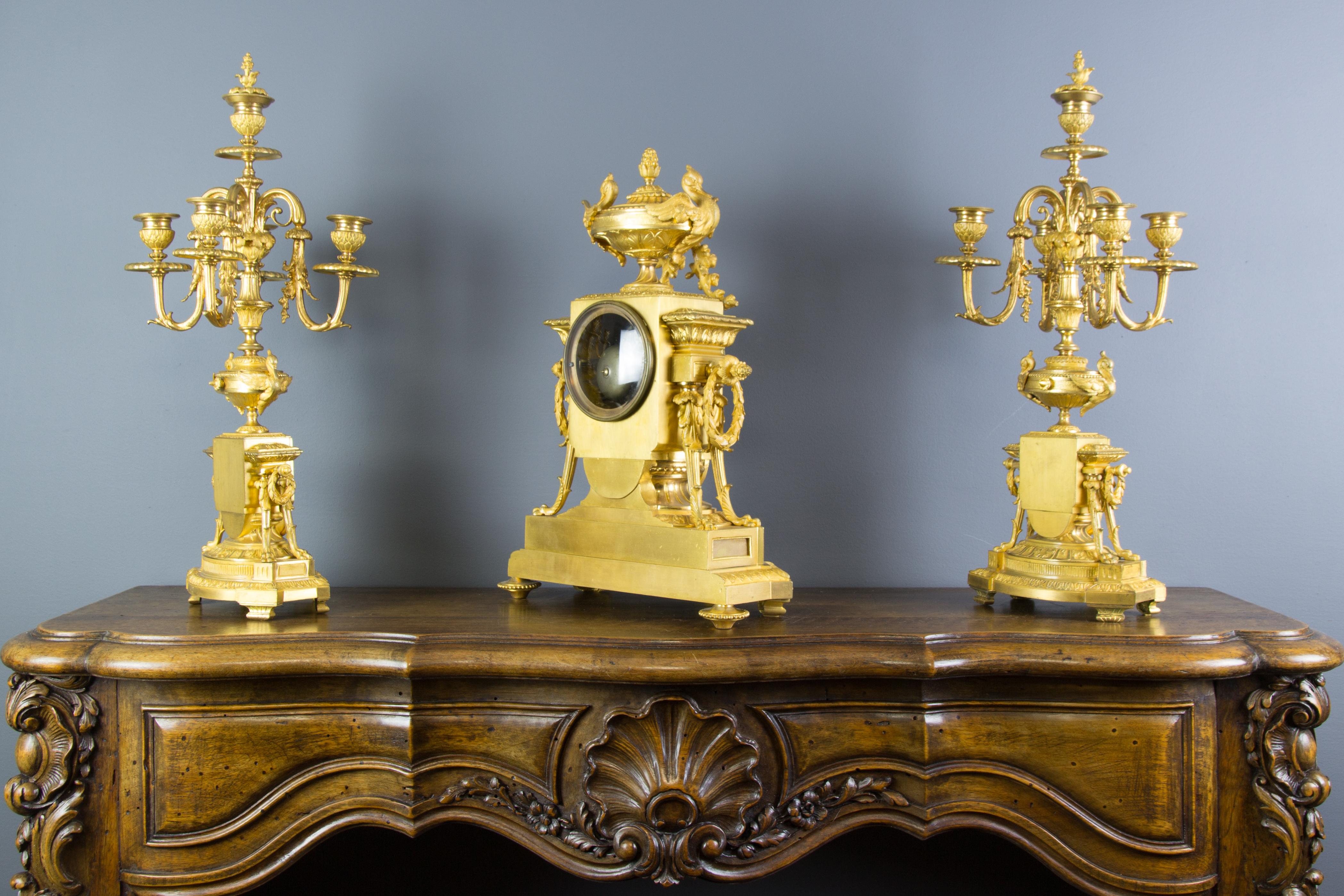 French Louis XVI Style Gilt Bronze Three-Piece Garniture Clock Set 1