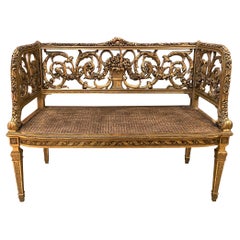 Antique French Louis XVI Style Gilt Carved Back Settee with Caned Seat