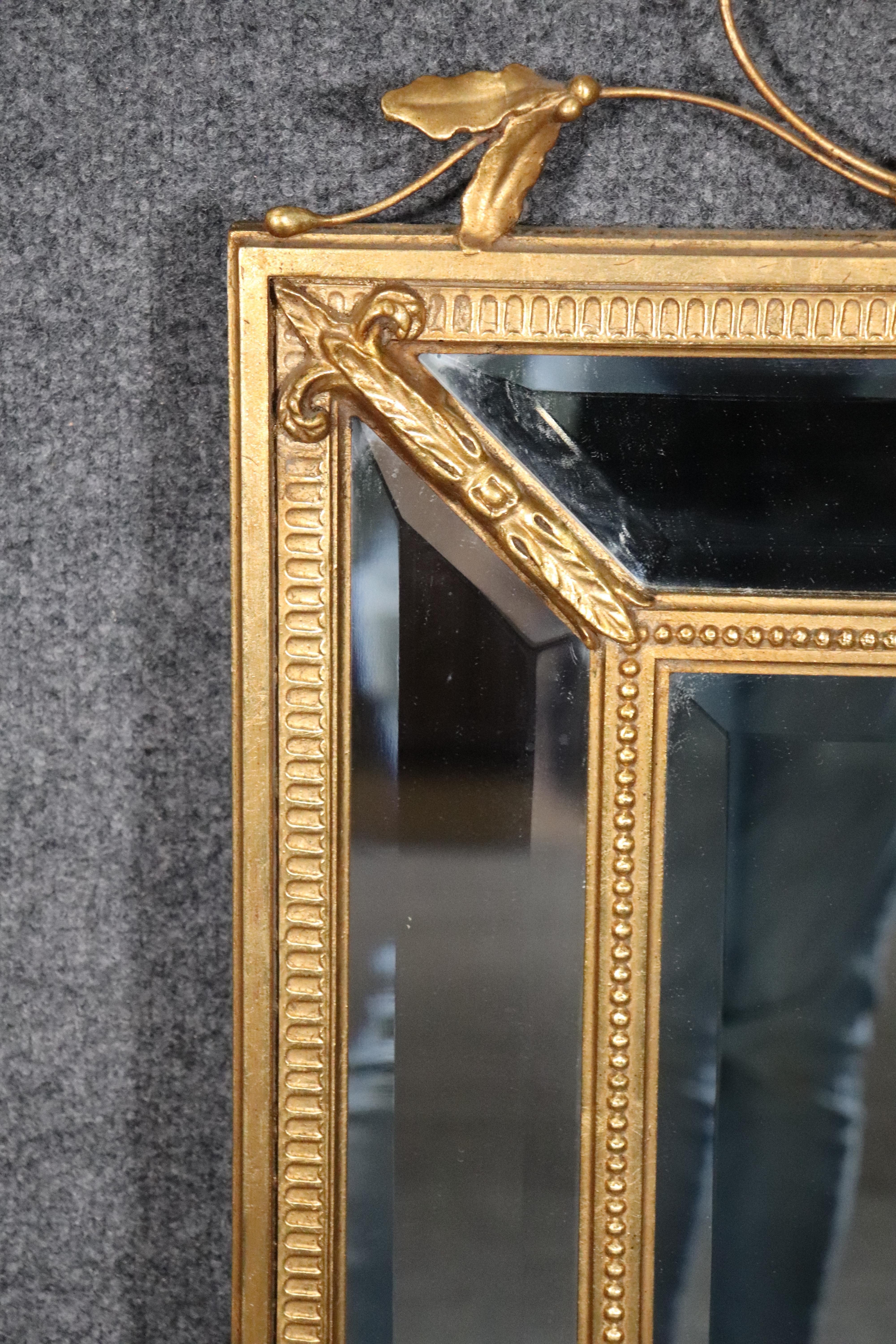 20th Century French Louis XVI Style Gilt Carved Beveled Glass Wall Hanging Mirror by Friedman