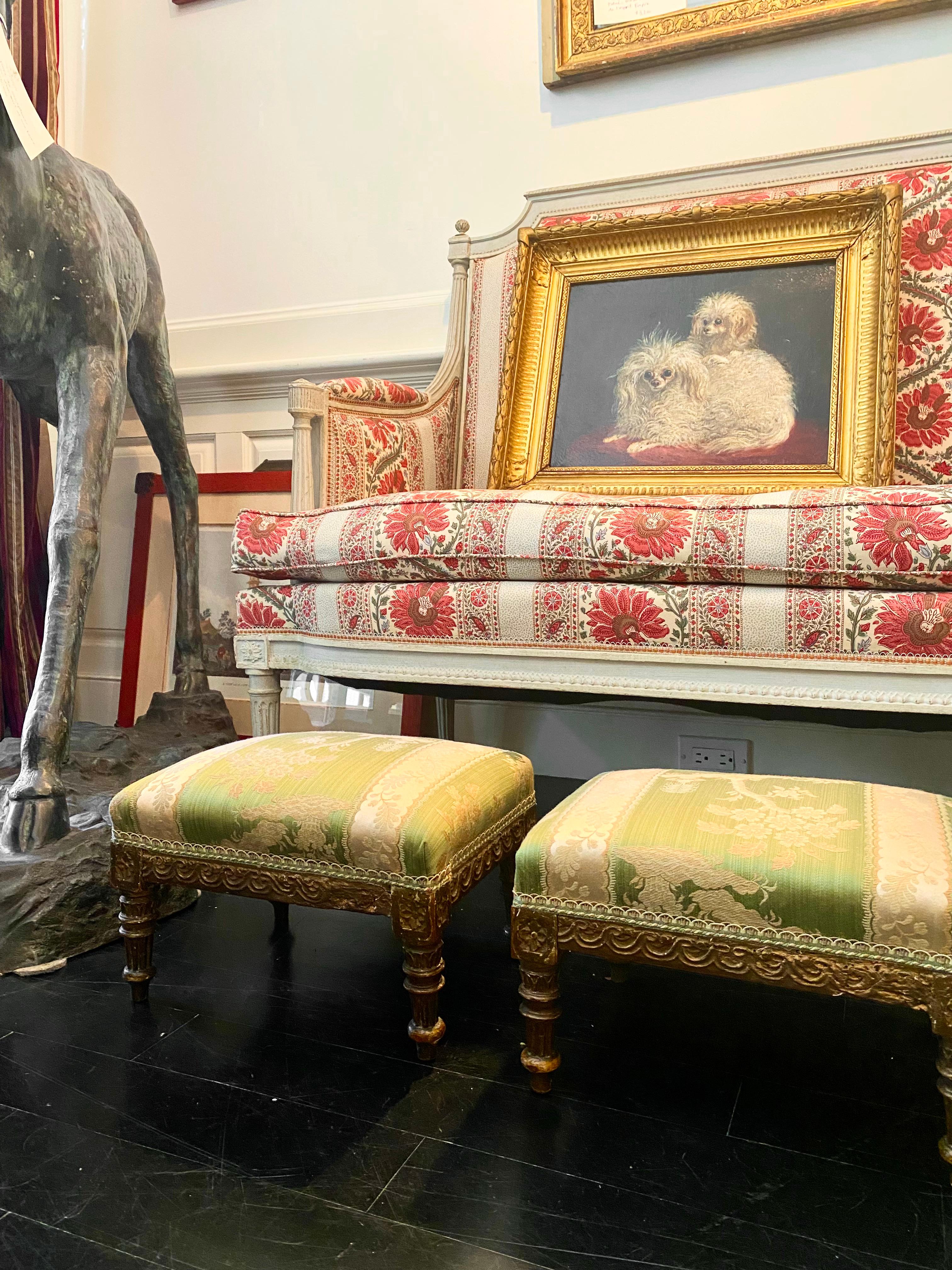 Pair of French ottomans, upholstered, padded and buttoned, with separate top cushions, Napoleon III Style, often referred to as 