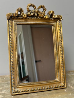 Miroir en bois doré de style Louis XVI, 19e siècle