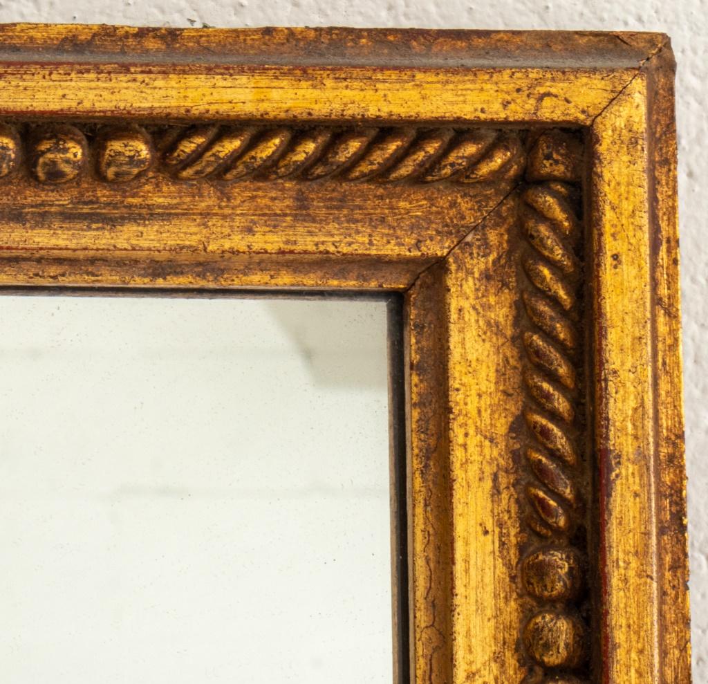 French Louis XVI style carved gilt wood mirror. Measures: 30.5