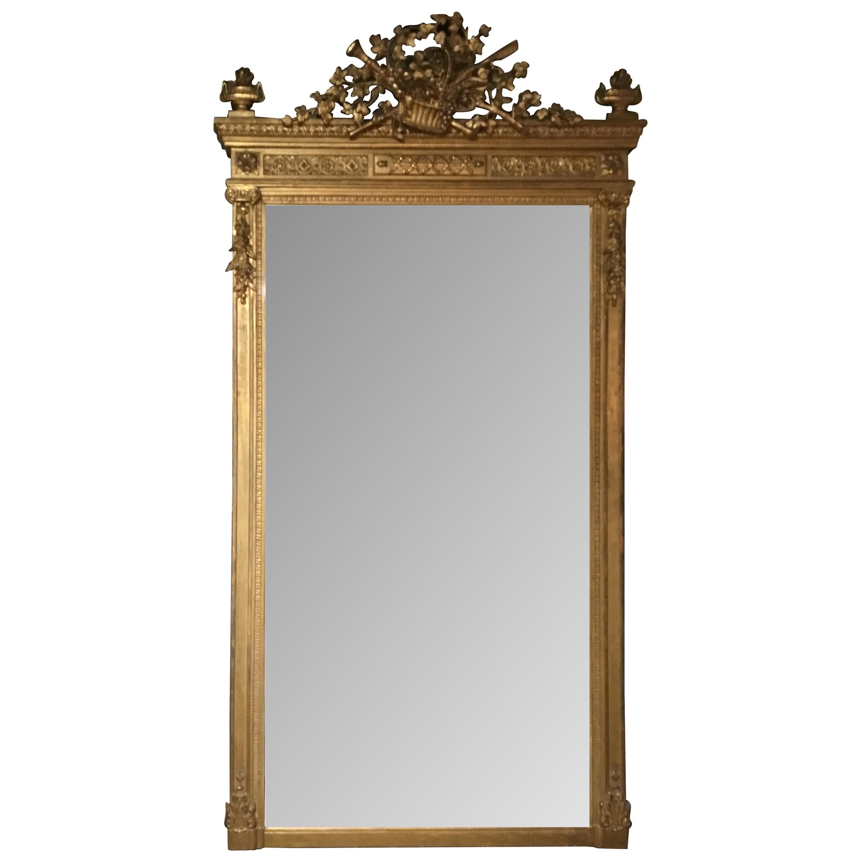 French Louis XVI Style Giltwood Mirror with Beveled Plate, Basket with Foliate For Sale