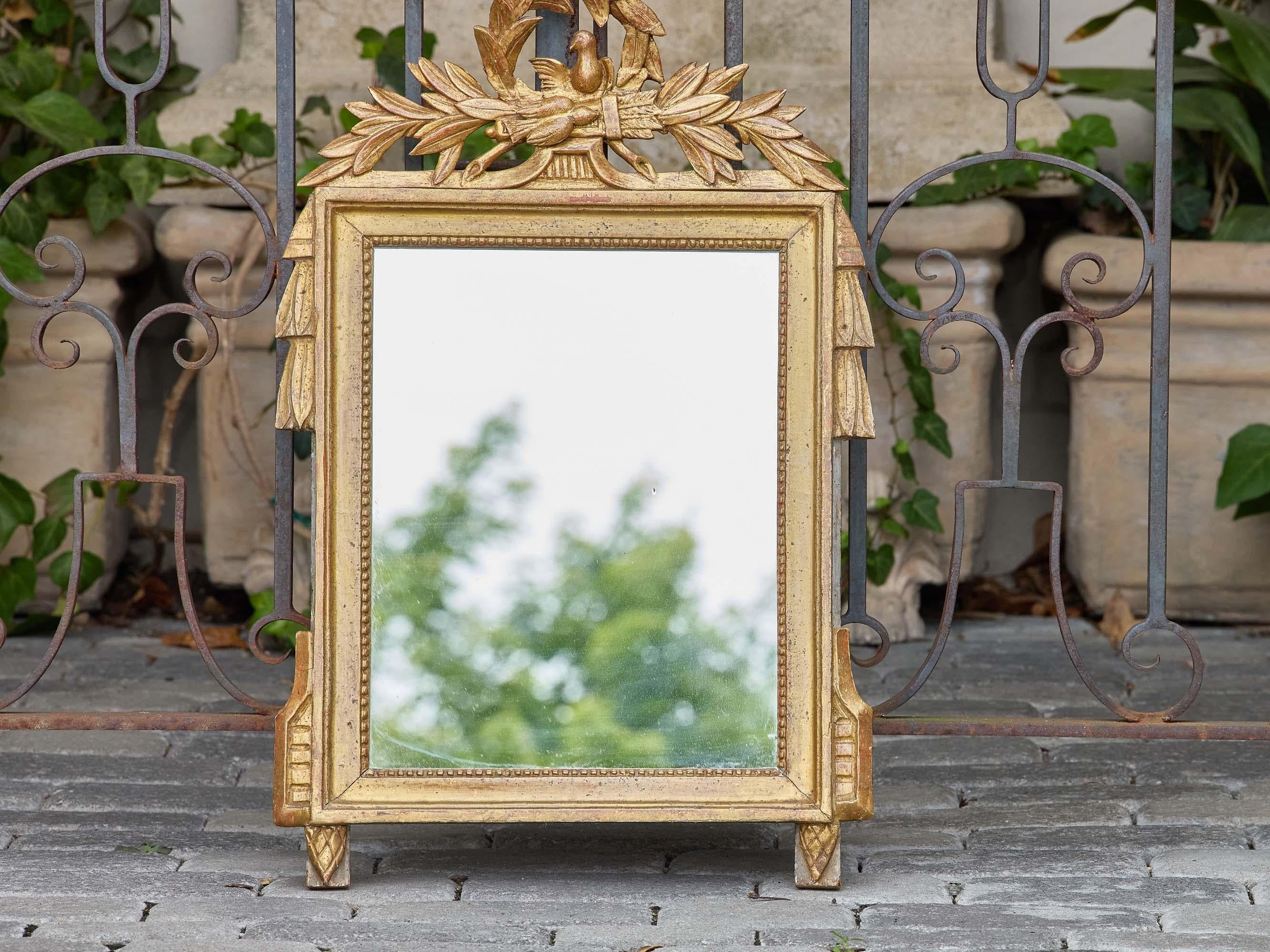 French Louis XVI Style Giltwood Mirror with Dove and Laurel Crest, circa 1920 In Good Condition For Sale In Atlanta, GA