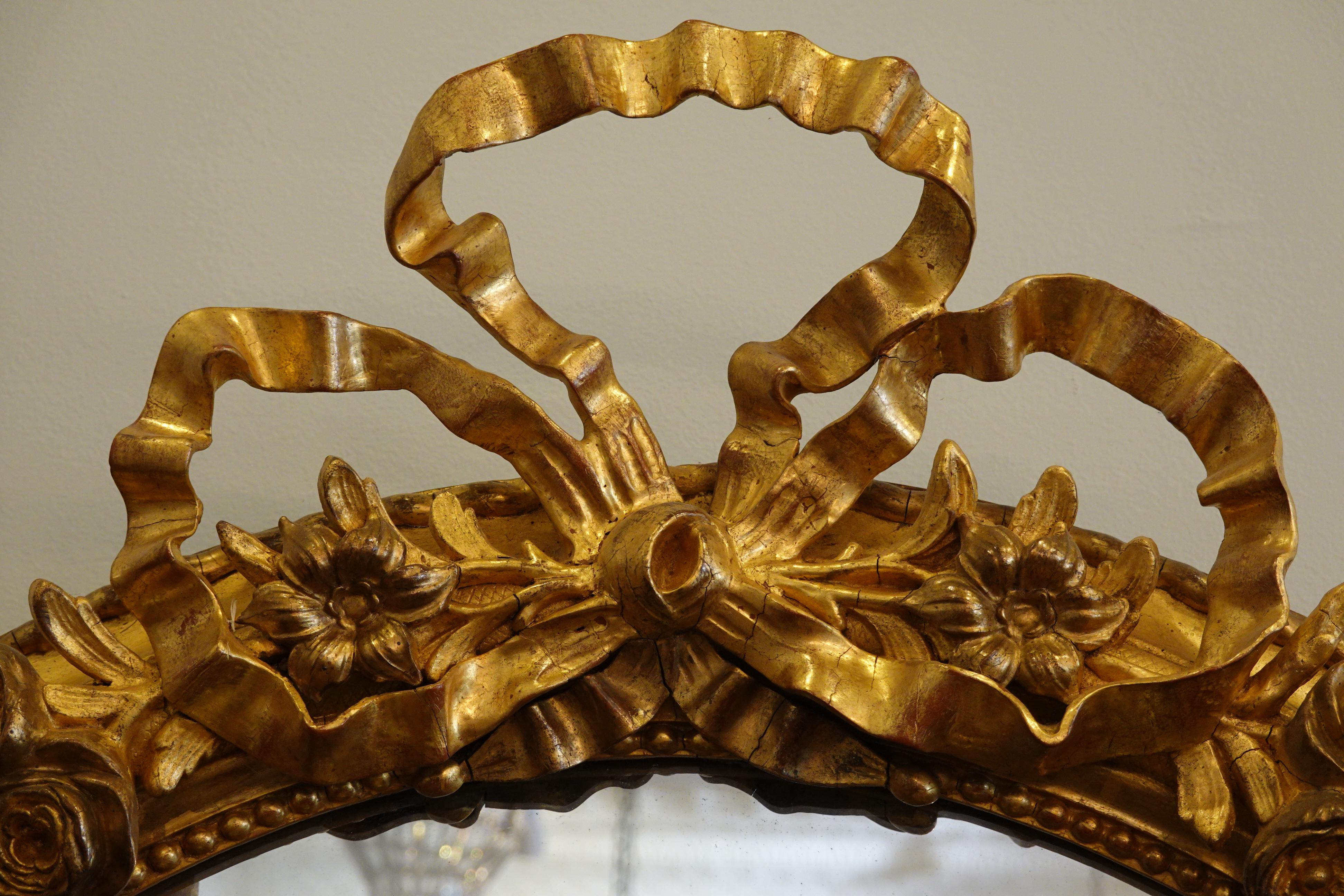 Hand-Carved French Louis XVI Style Giltwood Mirror with Large Carved Bow Cartouche For Sale