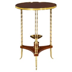 Tavolino Gueridon francese in stile Luigi XVI in mogano e bronzo