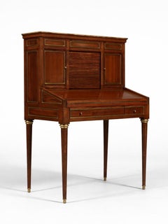 Secrétaire en acajou de style Louis XVI avec accents en laiton