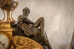 French Louis XVI Style Marble and Bronze Figural Clock