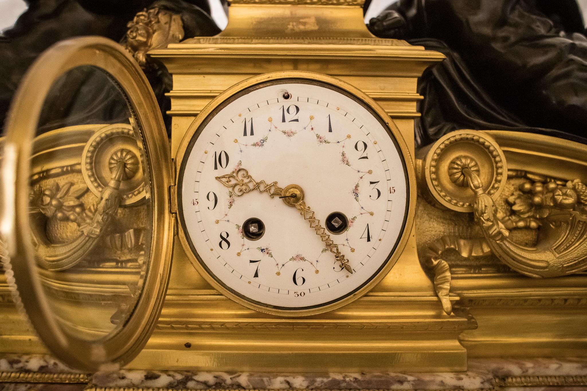 Late 19th Century French Louis XVI Style Marble and Bronze Figural Clock