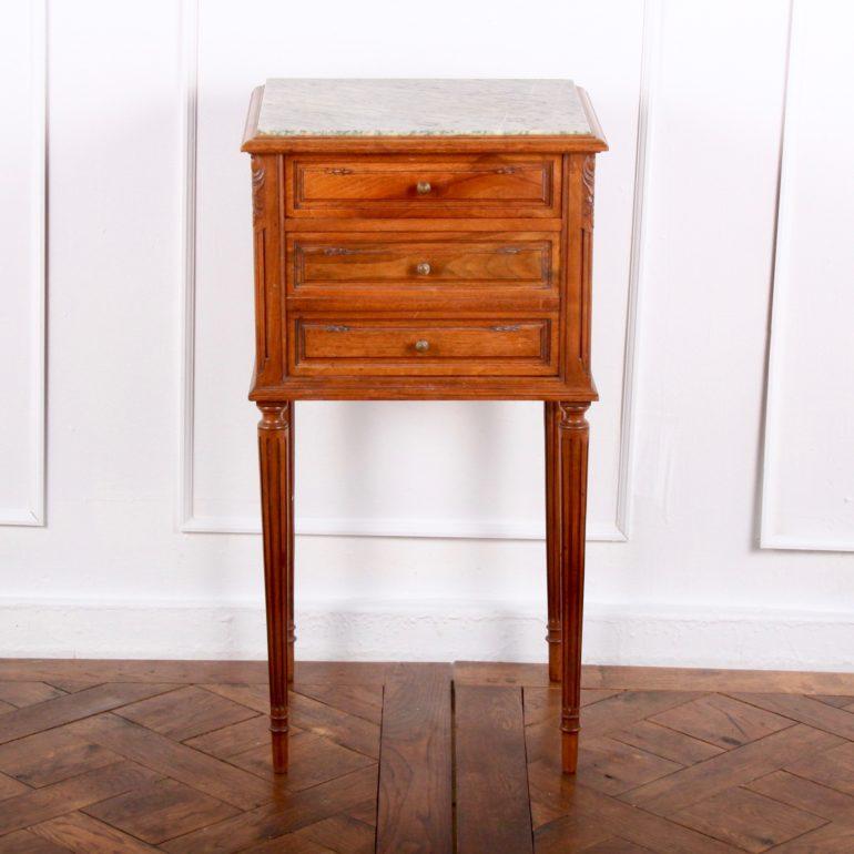 Louis XVI-style walnut nightstand with original marble top. One top drawer with the lower two drawers acting as a pull revealing a storage area, circa 1900.



   
