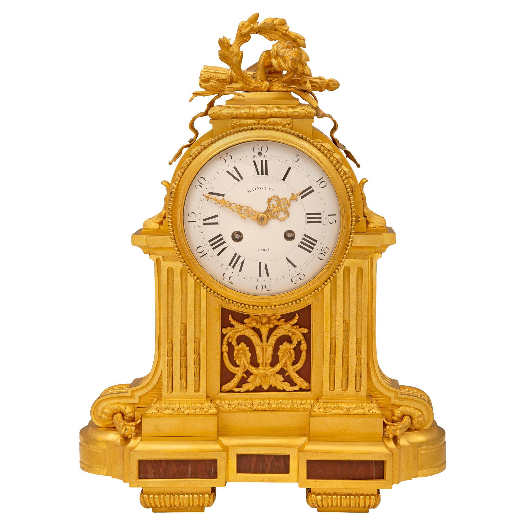 French Louis XVI Style Mid-19th Century Ormolu Marble Clock, Signed Frères