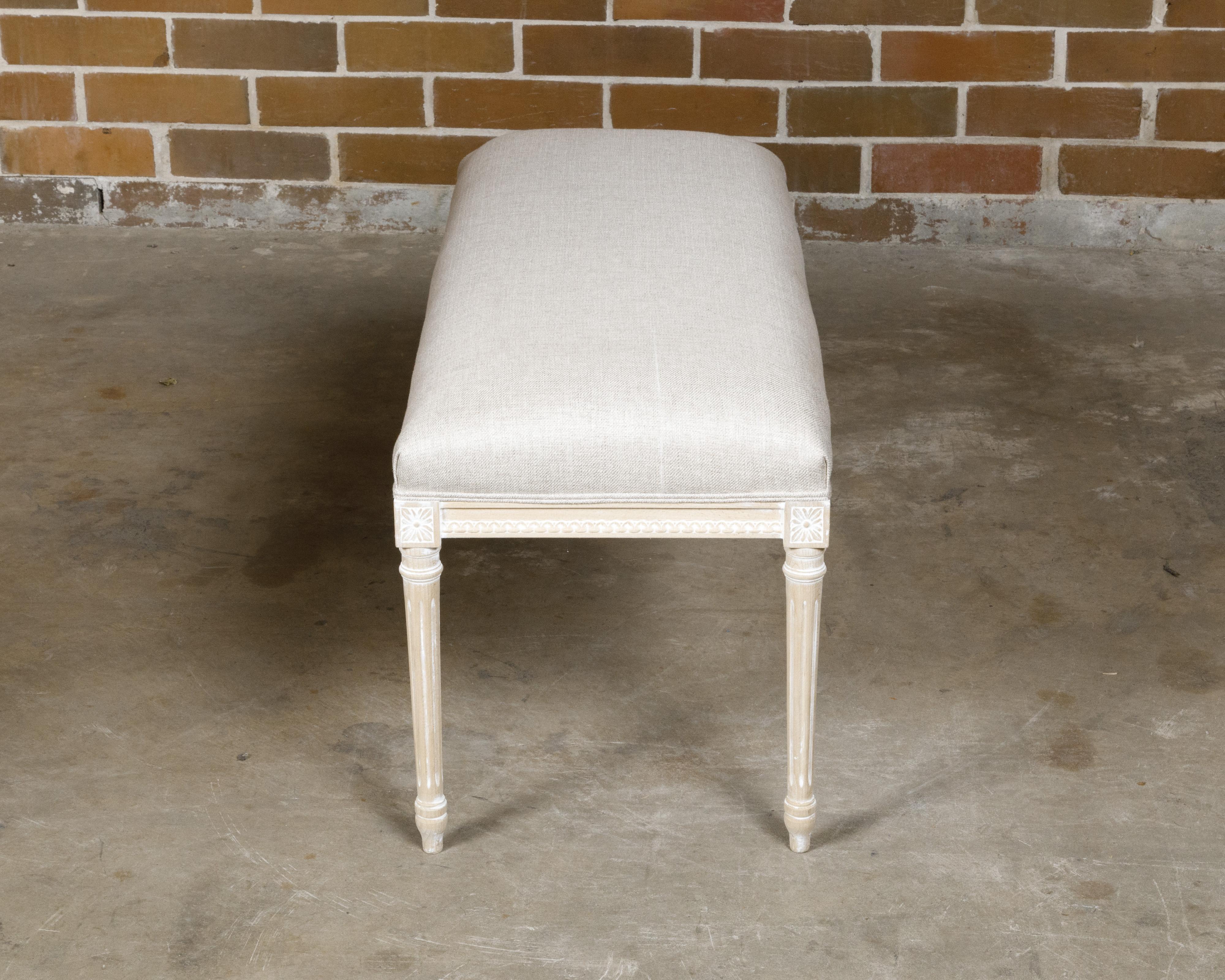 Carved French Louis XVI Style Natural Wood Bench with White Painted Accents, circa 1900 For Sale