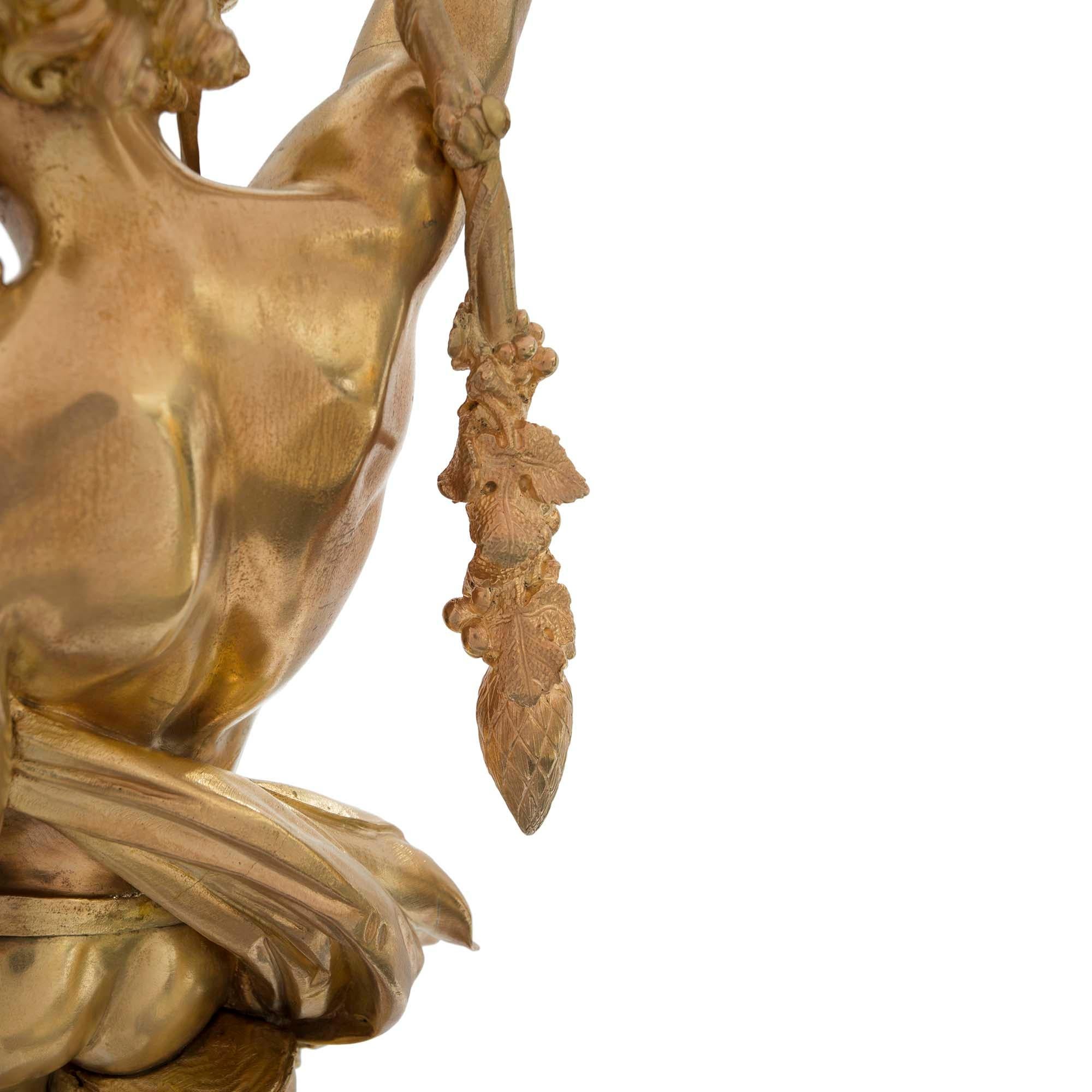 Bronze doré Statues figuratives festives françaises en bronze doré de style Louis XVI, signées Devaulx en vente