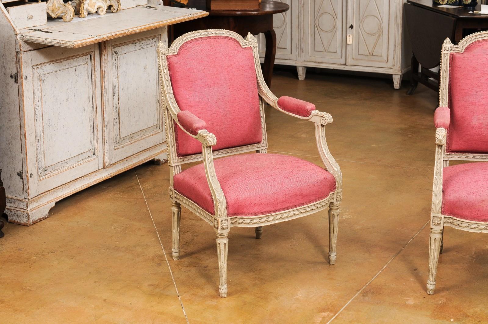 French Louis XVI Style Painted Armchairs with Richly Carved Décor, Sold Each In Good Condition For Sale In Atlanta, GA