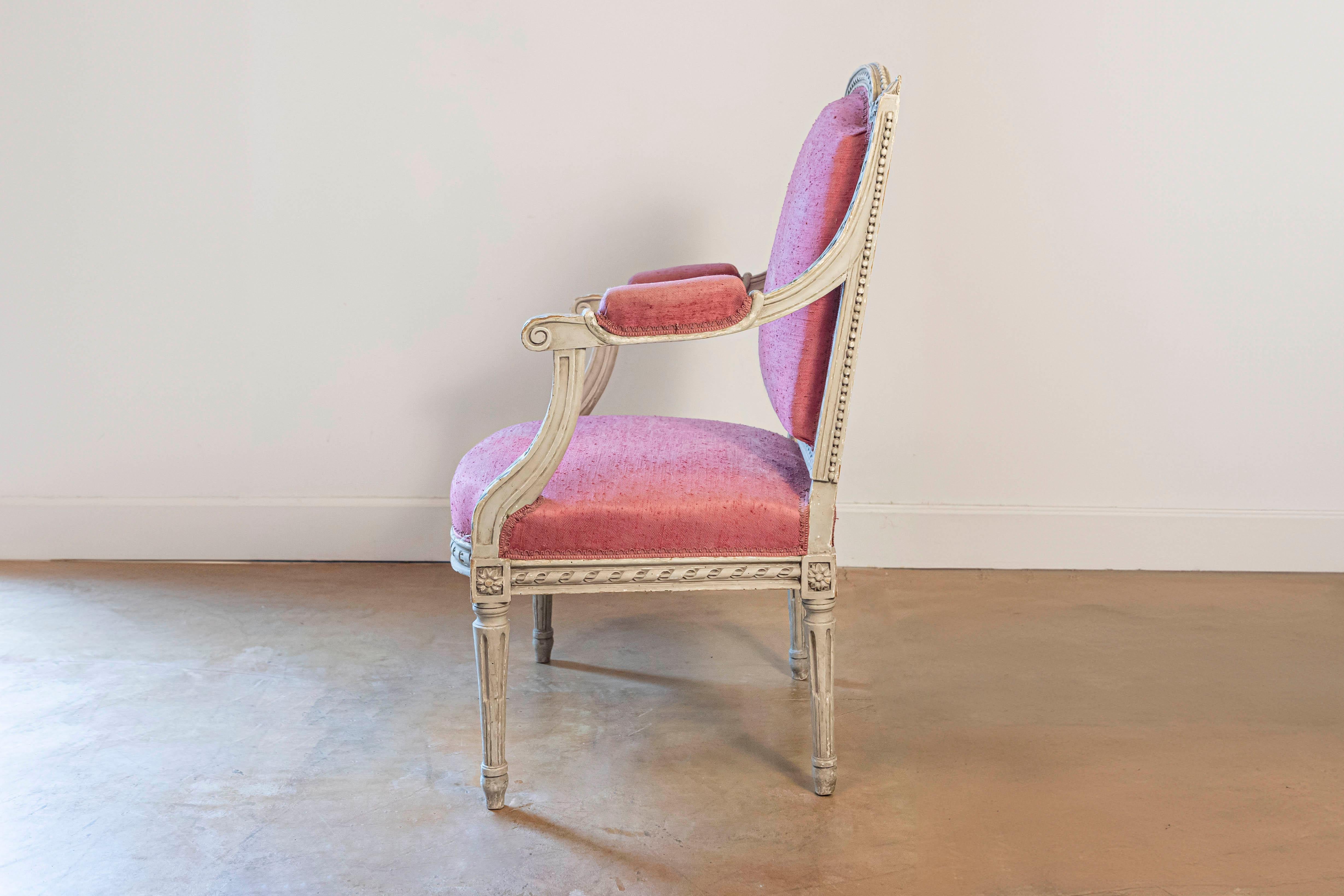 Upholstery French Louis XVI Style Painted Armchairs with Richly Carved Décor, Sold Each For Sale