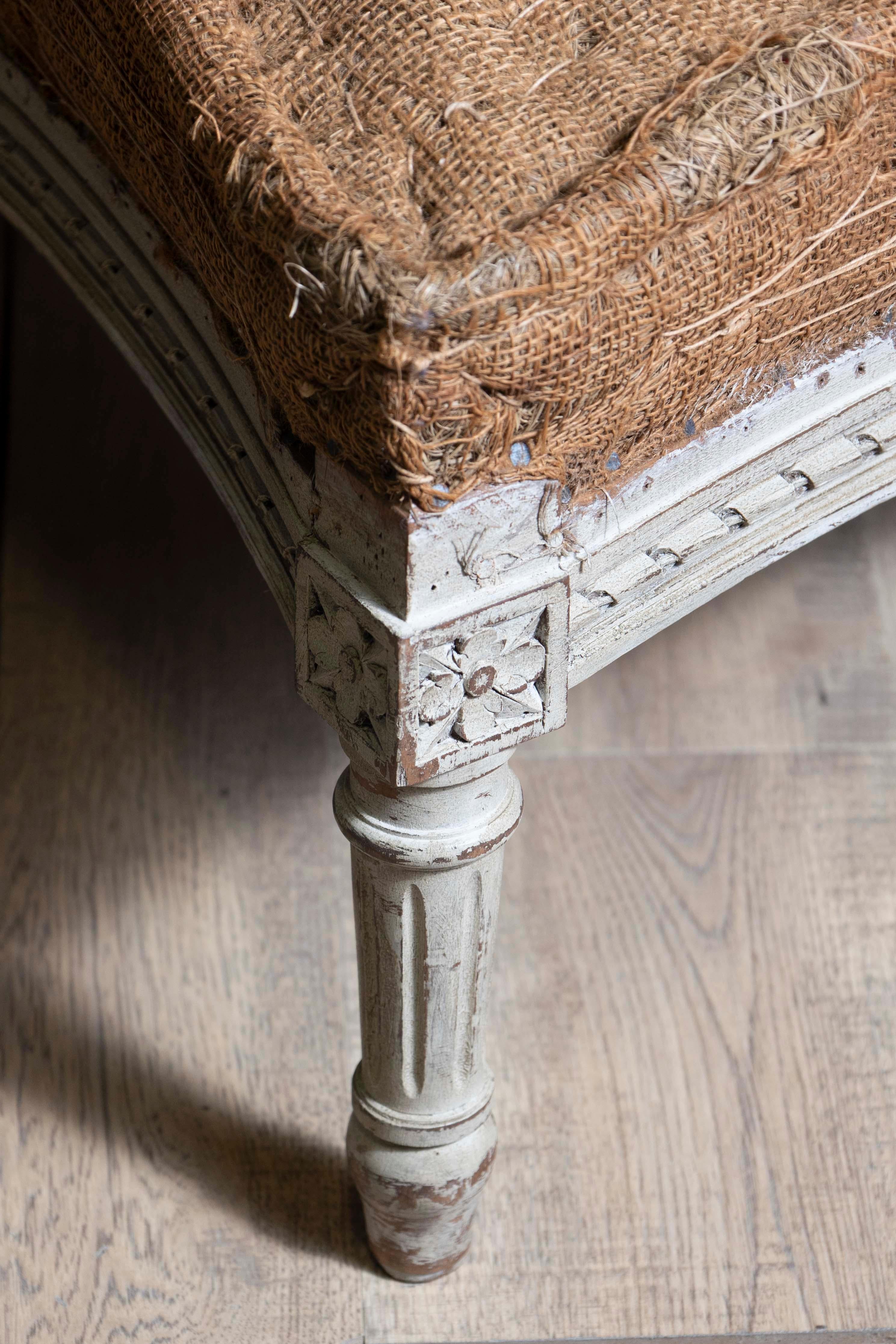 Carved French Louis XVI Style Painted Bergère with Matching Ottoman, circa 1870
