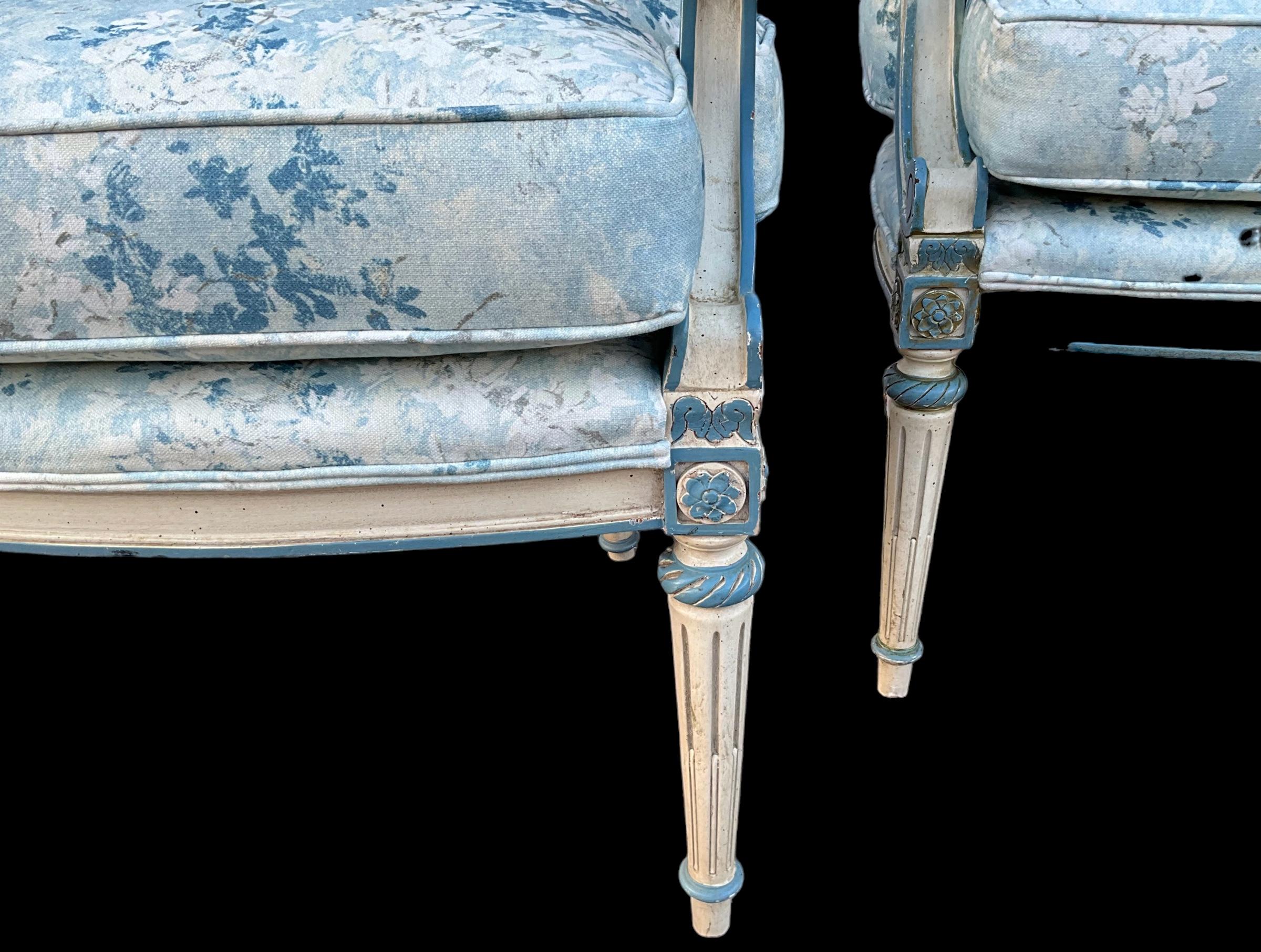 American French Louis XVI Style Painted Blue Bergere Chairs In Floral Upholstery- Pair For Sale