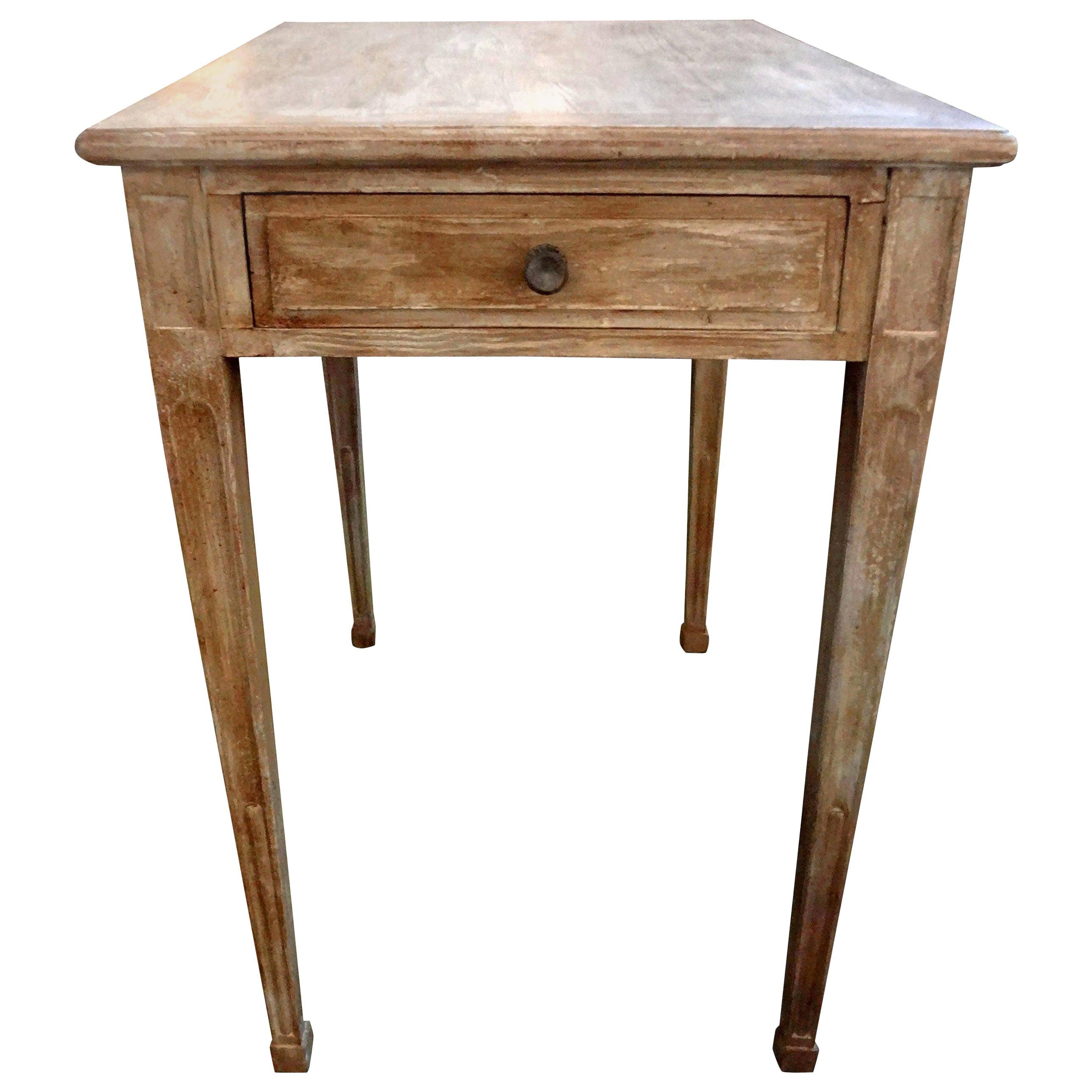 Charming late 19th-early 20th century French Louis XVI style painted guéridon, side table, or drink table with fluted legs and single drawer. Great patina!

 