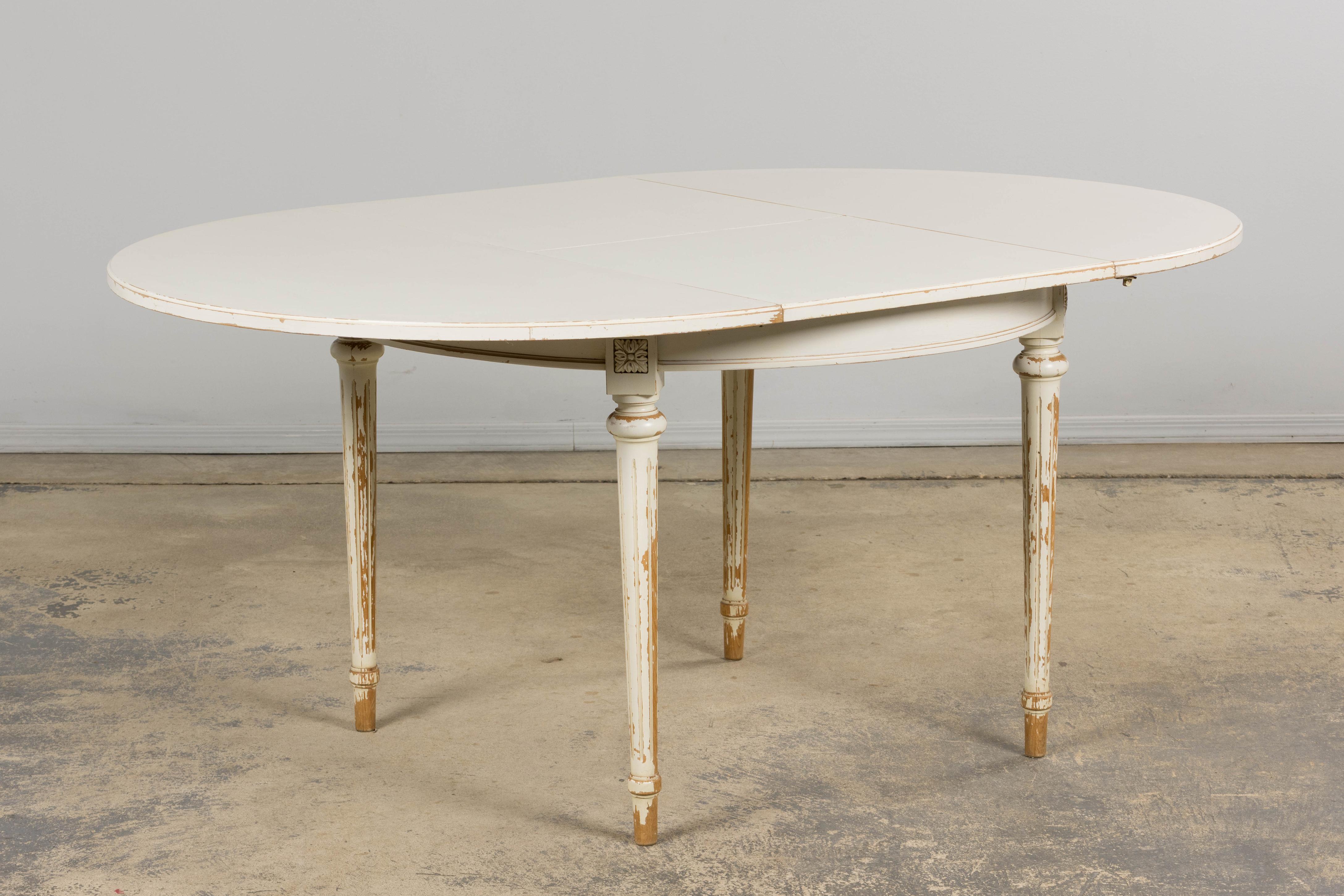 Hardwood French Louis XVI Style Painted White Off-Round Extendable Dining Table For Sale