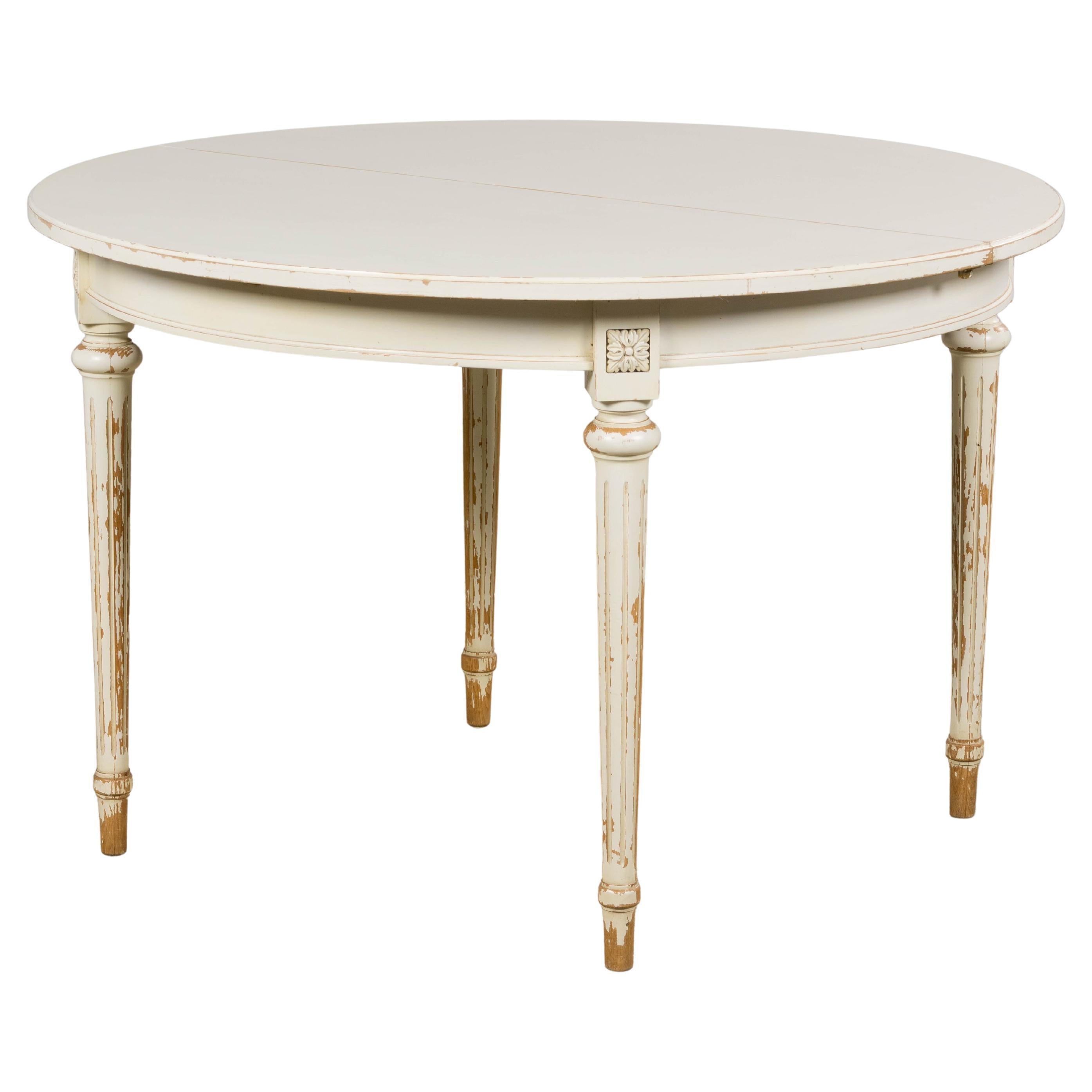 French Louis XVI Style Painted White Off-Round Extendable Dining Table For Sale