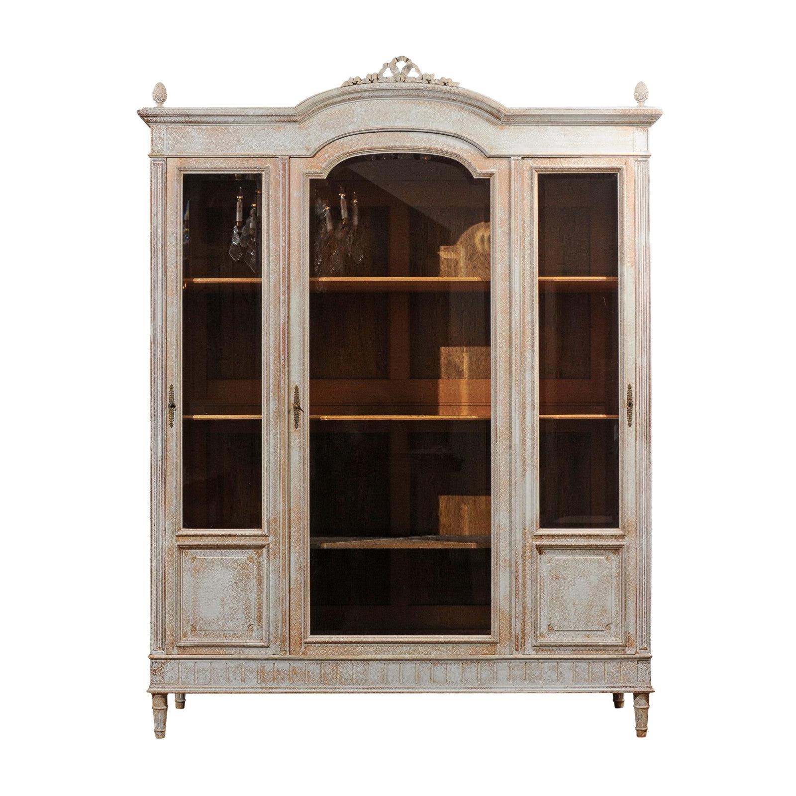 French Louis XVI Style Painted Wood Cabinet with Glass Doors and Bonnet Cornice