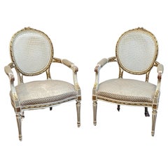 French Louis XVI style pair Partial Gilt painted cane back Armchairs