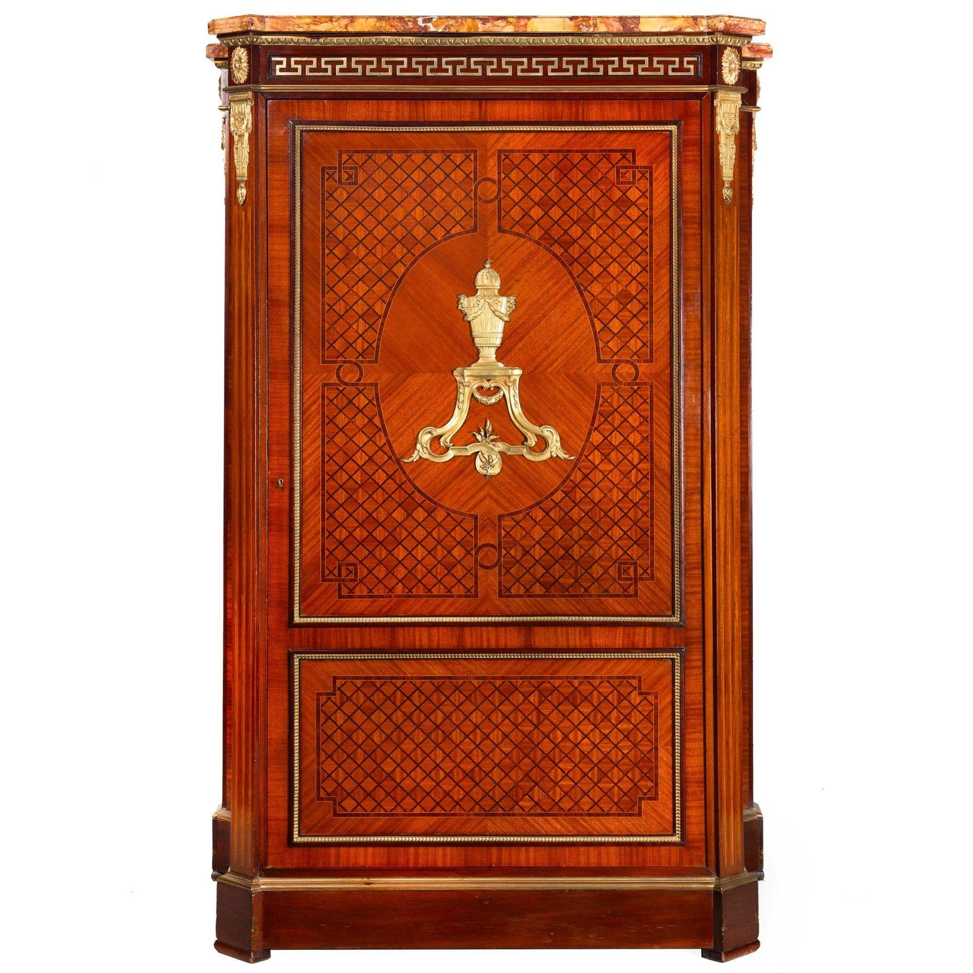 LOUIS XVI STYLE PARQUETRY-INLAID ORMOLU MOUNTED ONE-DOOR ARMOIRE
Paris, France circa 1880  lock stamped 