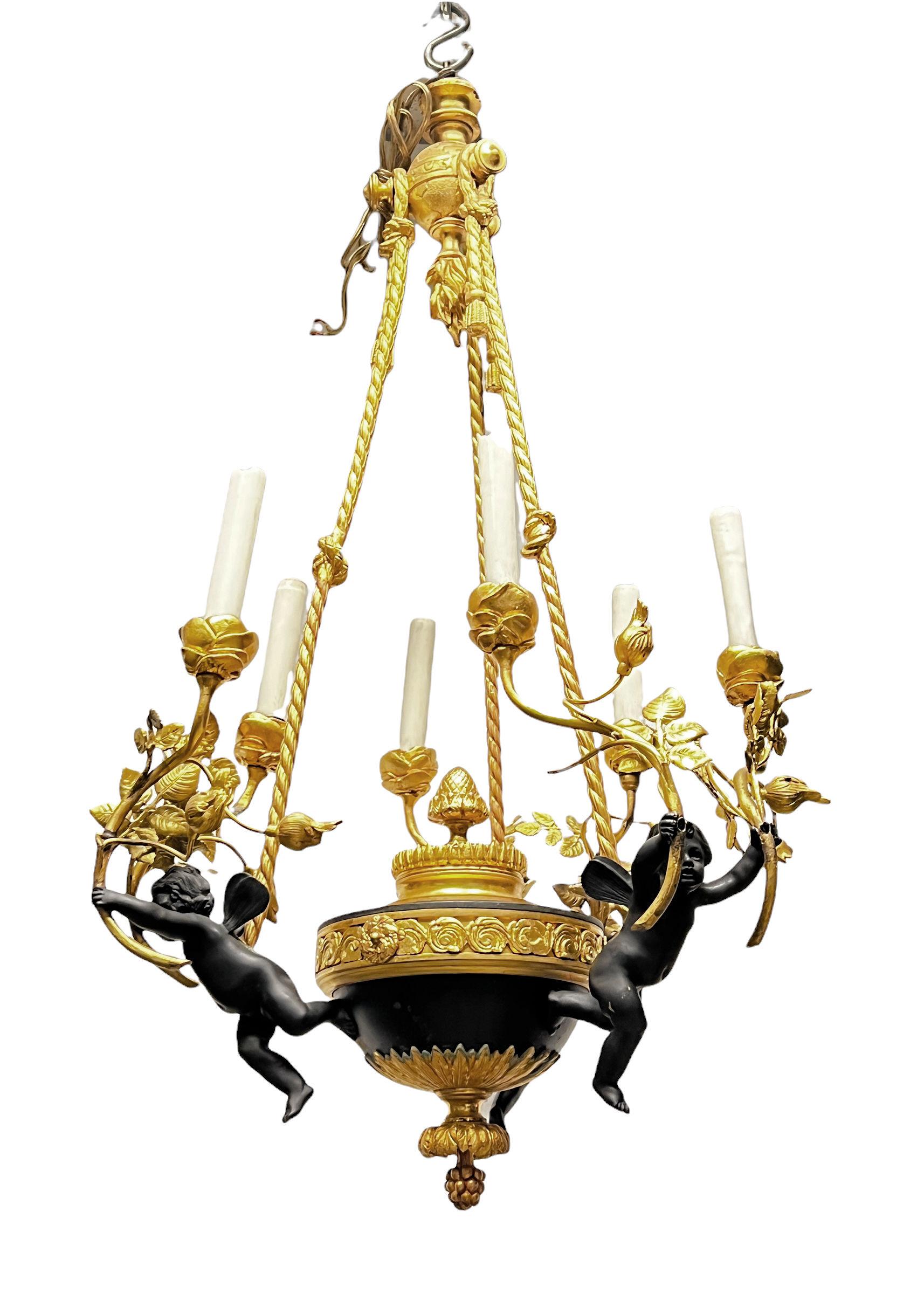 Early 20th Century French Louis XVI Style Patinated Bronze Six-Light Putti Motif Chandelier For Sale