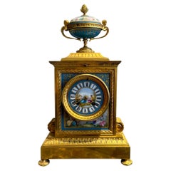French Louis XVI Style Porcelain and Gilt Bronze Mantel Clock, 19th Century