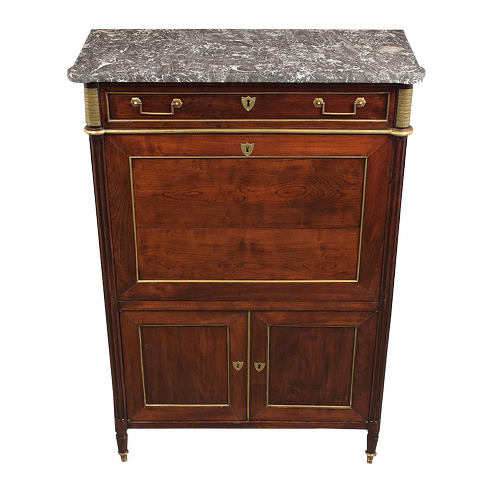 This French Louis XVI style secretaire early 19th century has been restored and is in great condition. It has the original dark grey marble top, single larger drawer with drop handles. And fine brass molding details throughout the piece. This