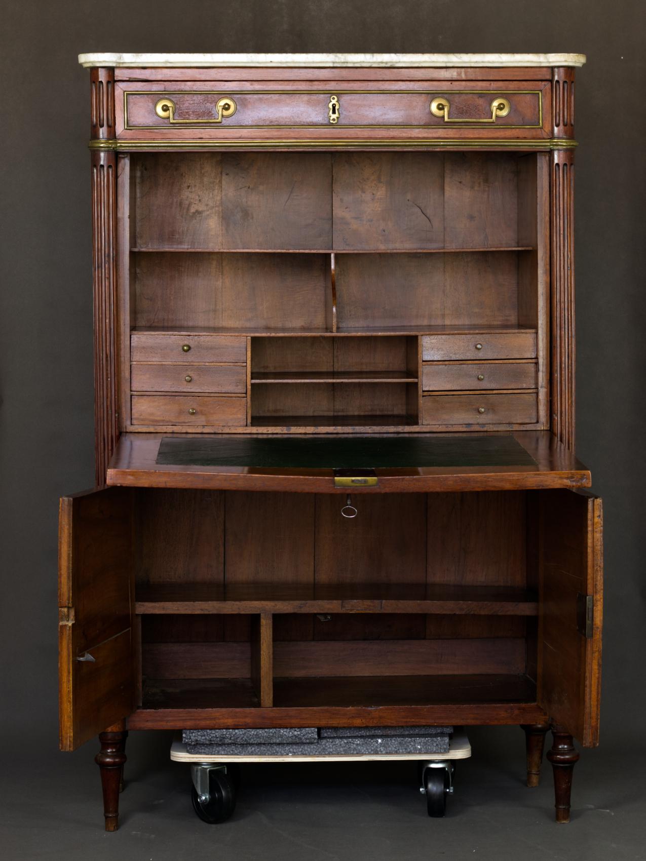 The secrétaire à abbatant or fall front desk is nearly identical to the desk 5th President James Monroe brought back from France in 1797. These desks are elegant examples of the popular style during the last decade of the 18th century. 
The Monroe