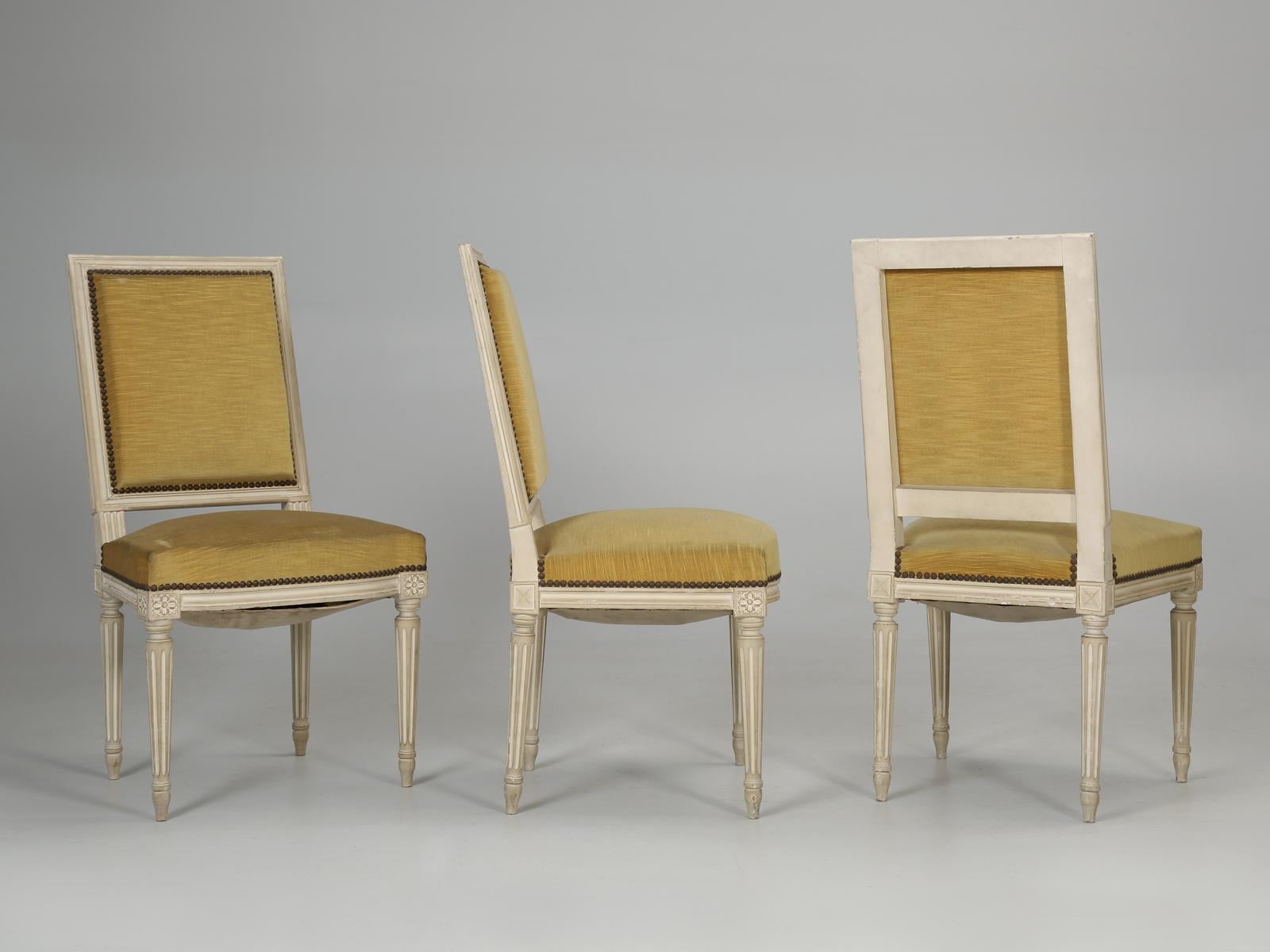 Vintage set of (6) French Louis XVI style dining chairs. Our set of (6) matching French Louis XVI dining chairs were found near the town of Autun, which is north of Lyon, and is famous for fine dining. The chairs have some real heft to them,