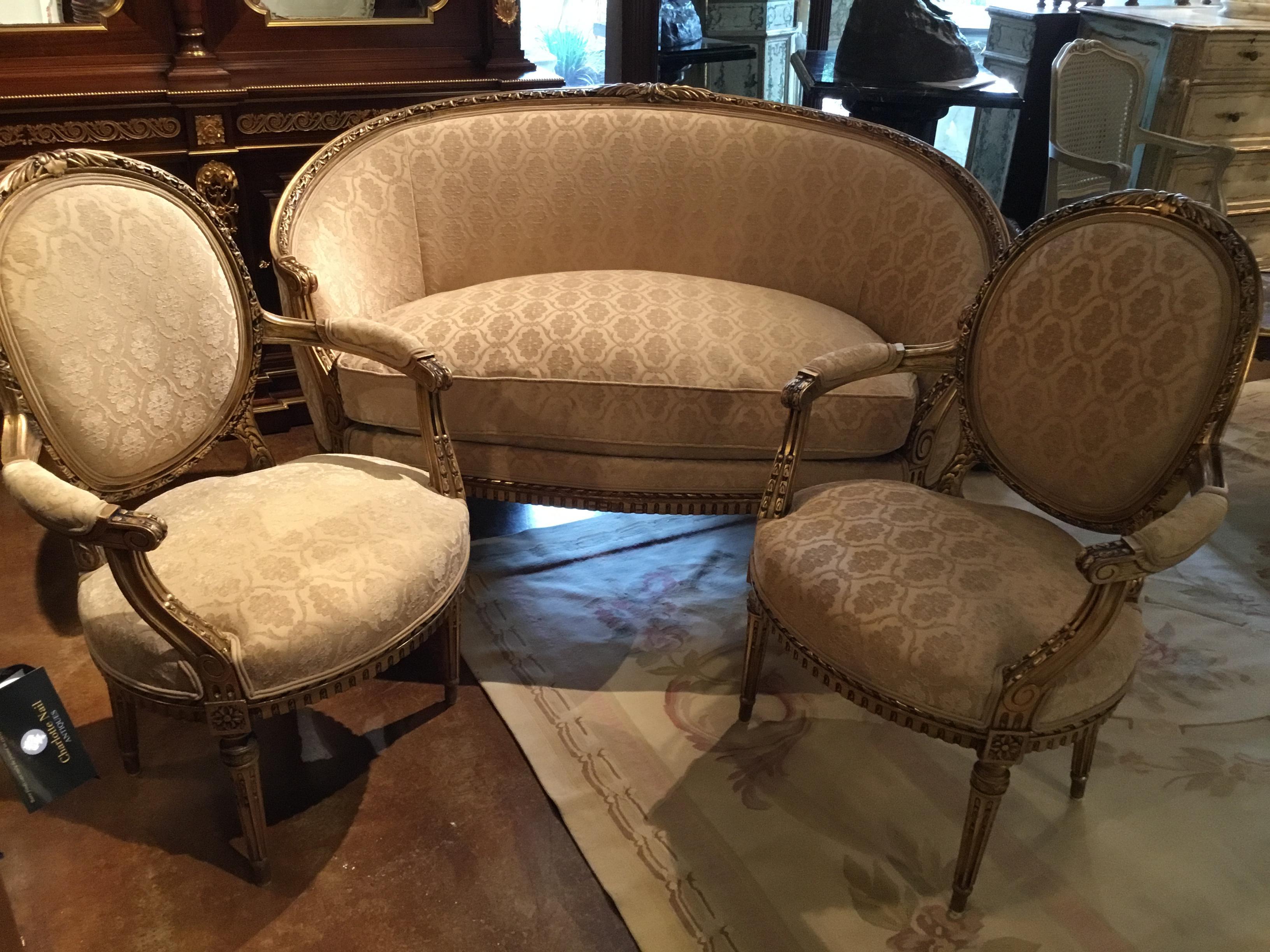 19th Century French Louis XVI Style Settee and Two Armchairs, Giltwood, Cream Hue For Sale
