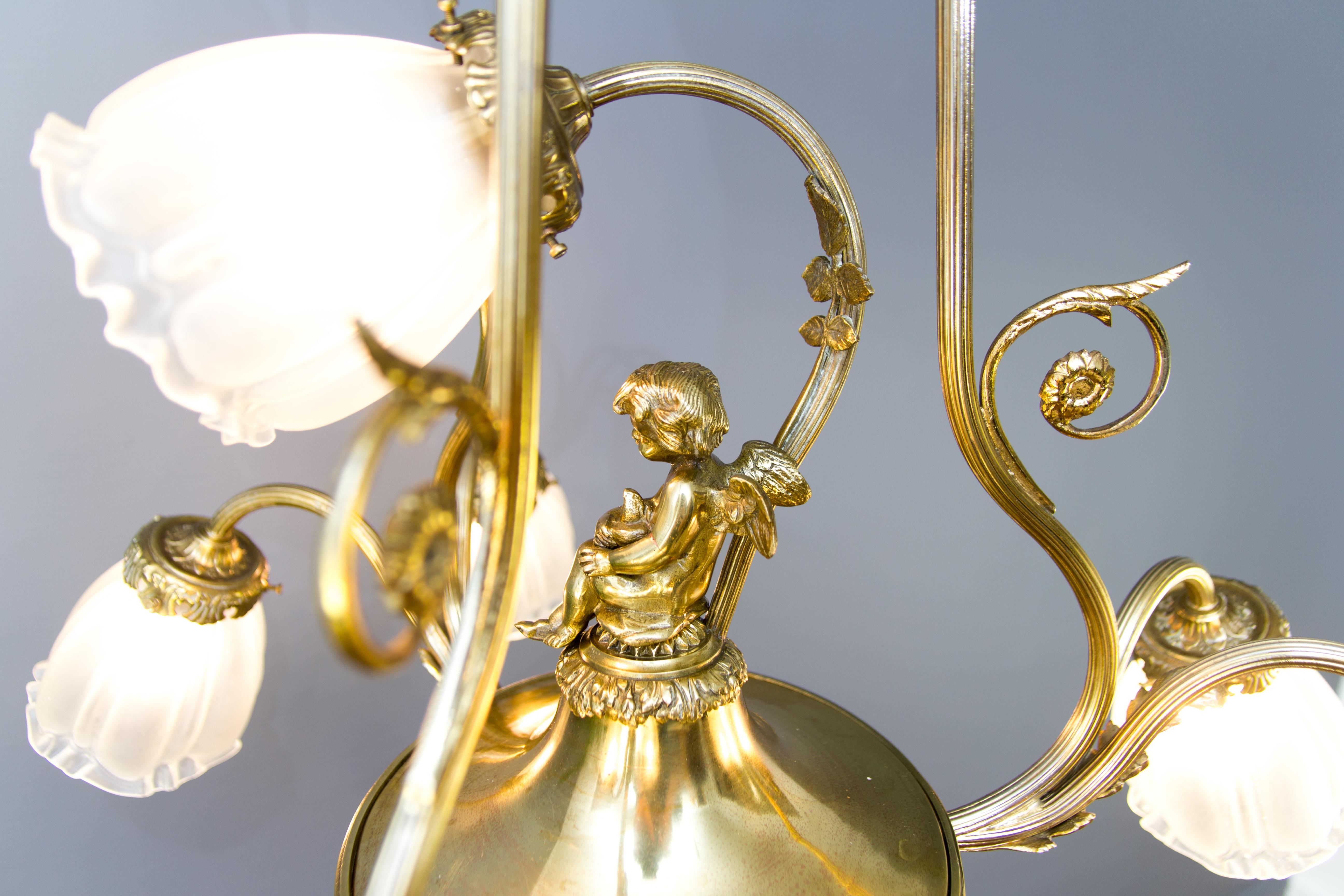French Louis XVI Style Seven-Light Brass, Bronze and Glass Cherub Chandelier 7