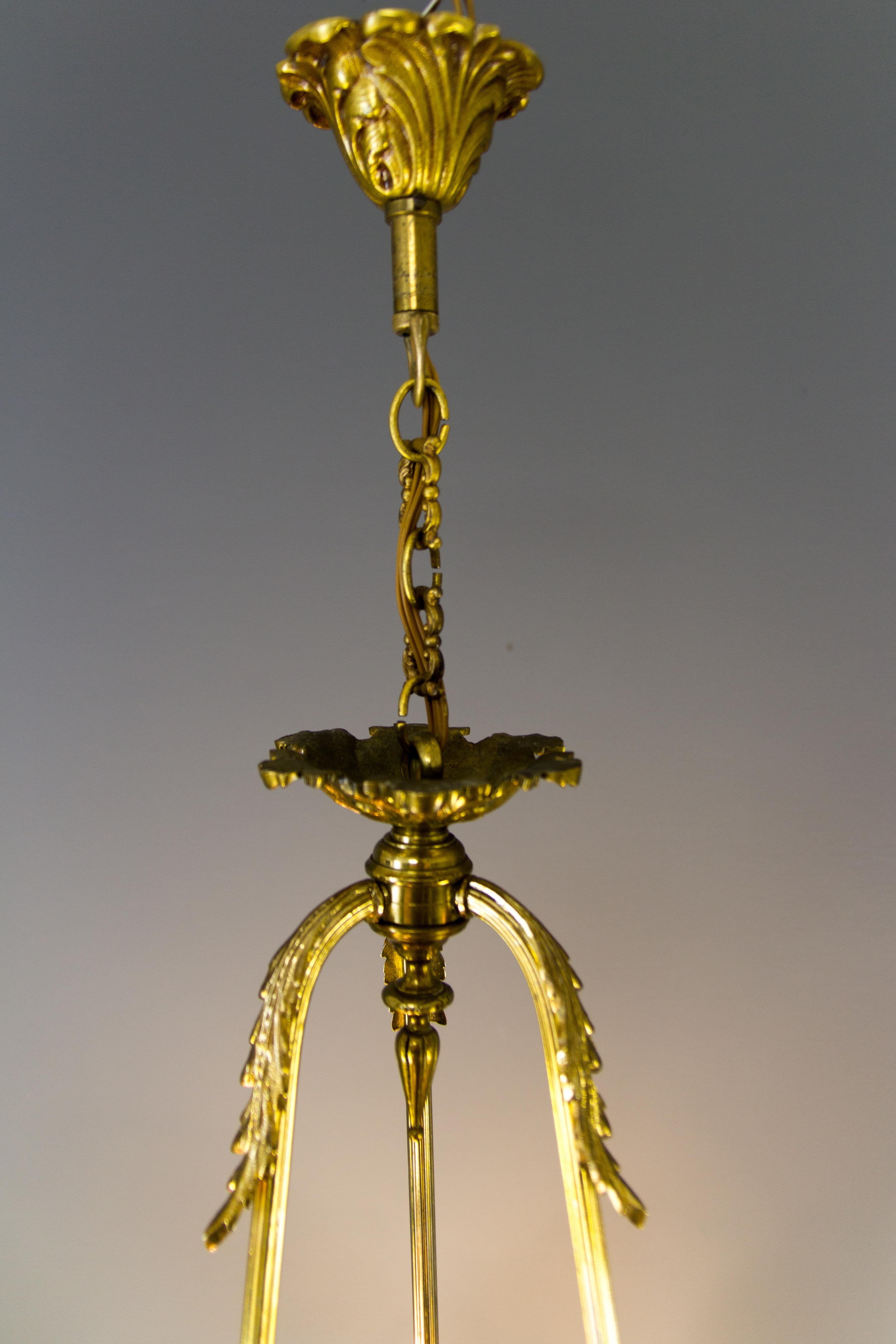 French Louis XVI Style Seven-Light Brass, Bronze and Glass Cherub Chandelier 8