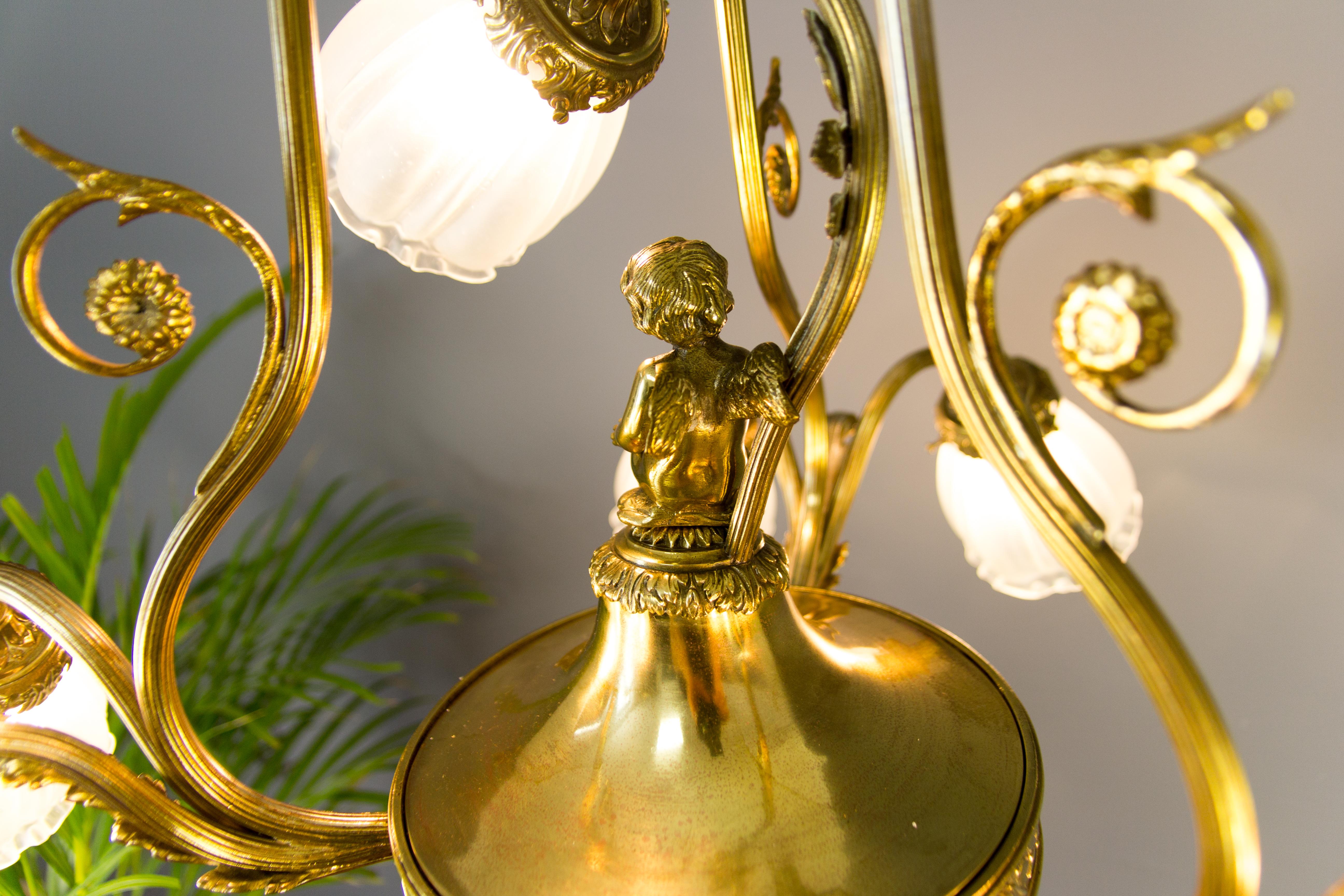 French Louis XVI Style Seven-Light Brass, Bronze and Glass Cherub Chandelier 9