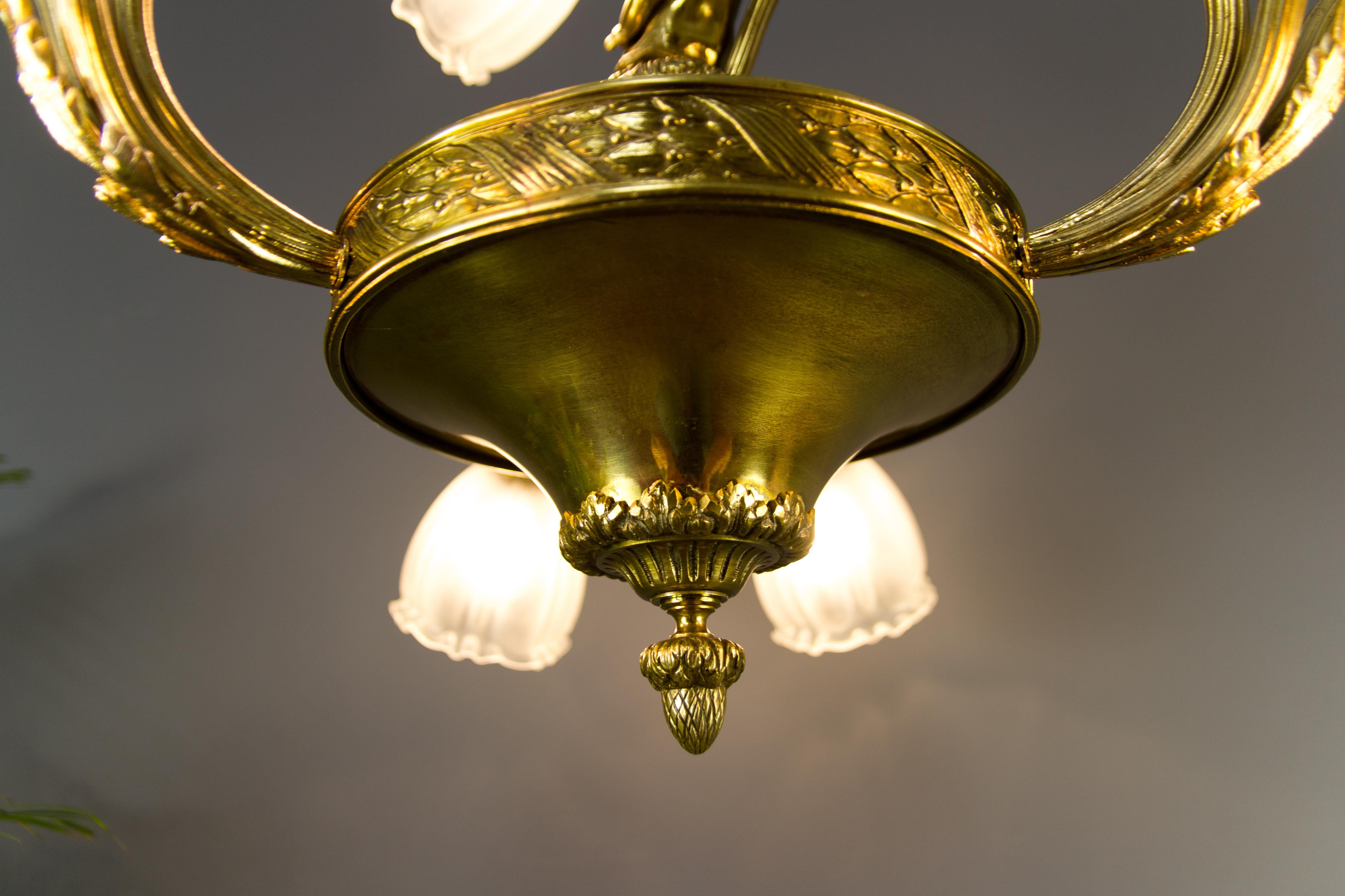French Louis XVI Style Seven-Light Brass, Bronze and Glass Cherub Chandelier 11