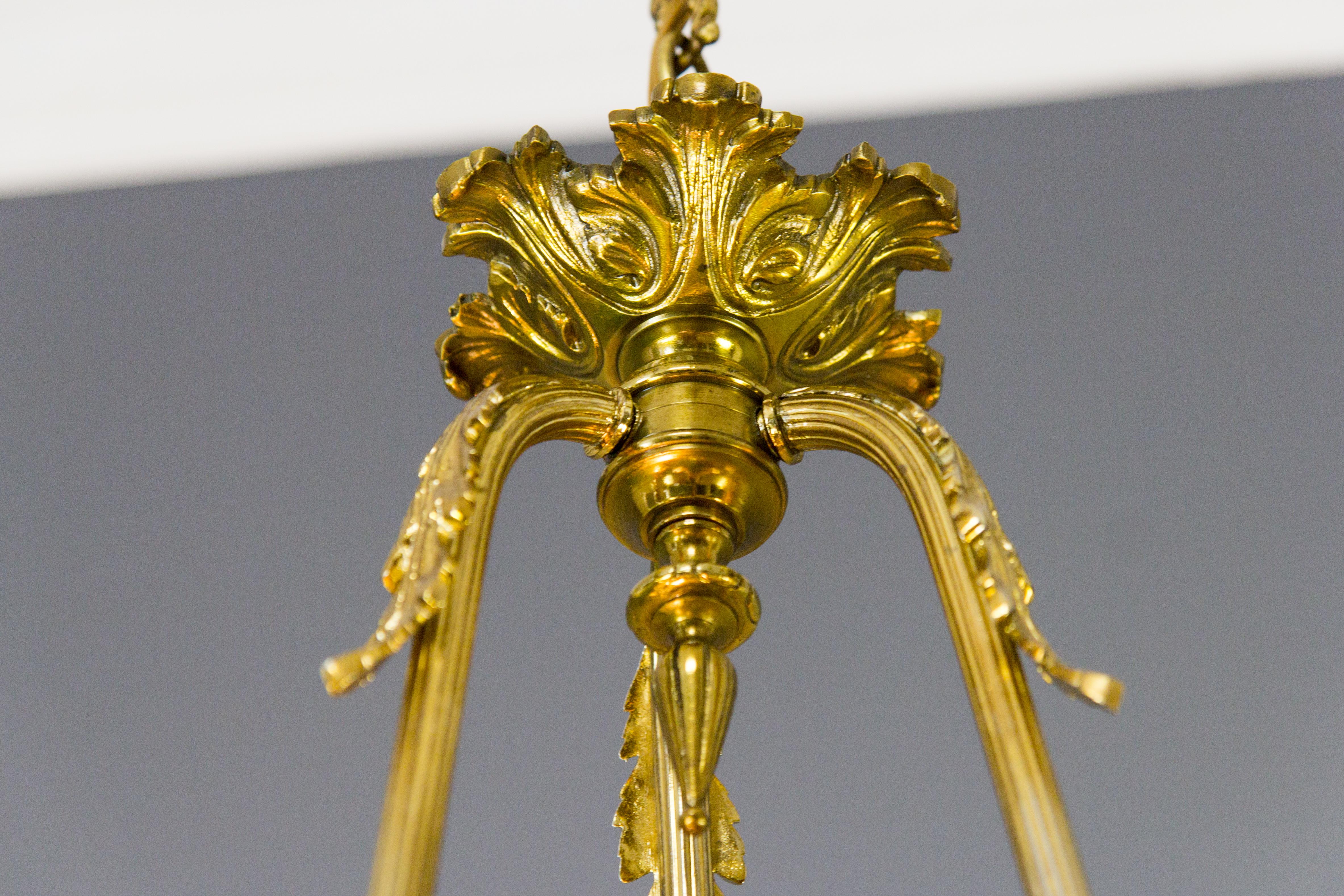 French Louis XVI Style Seven-Light Brass, Bronze and Glass Cherub Chandelier 12