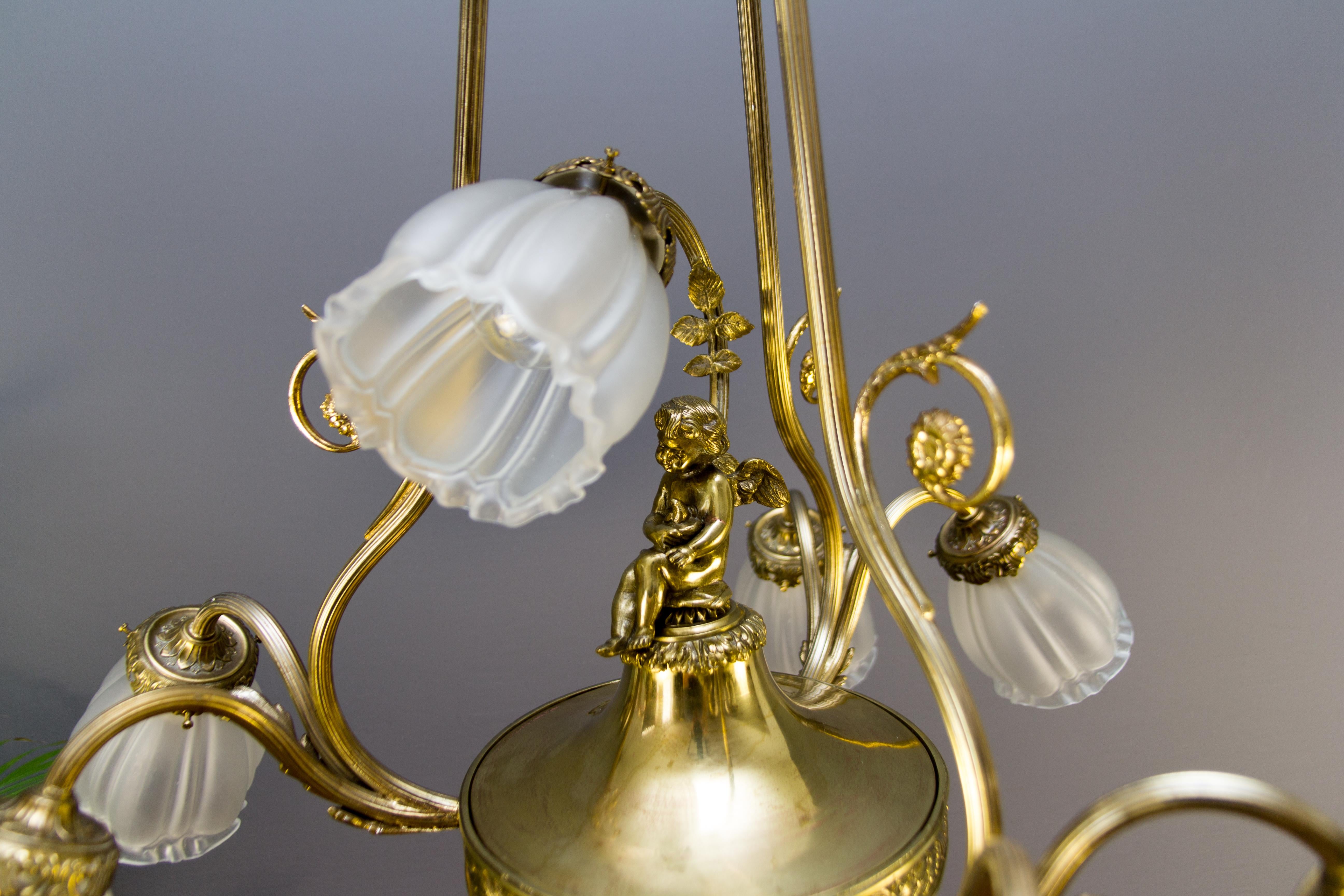 French Louis XVI Style Seven-Light Brass, Bronze and Glass Cherub Chandelier 14