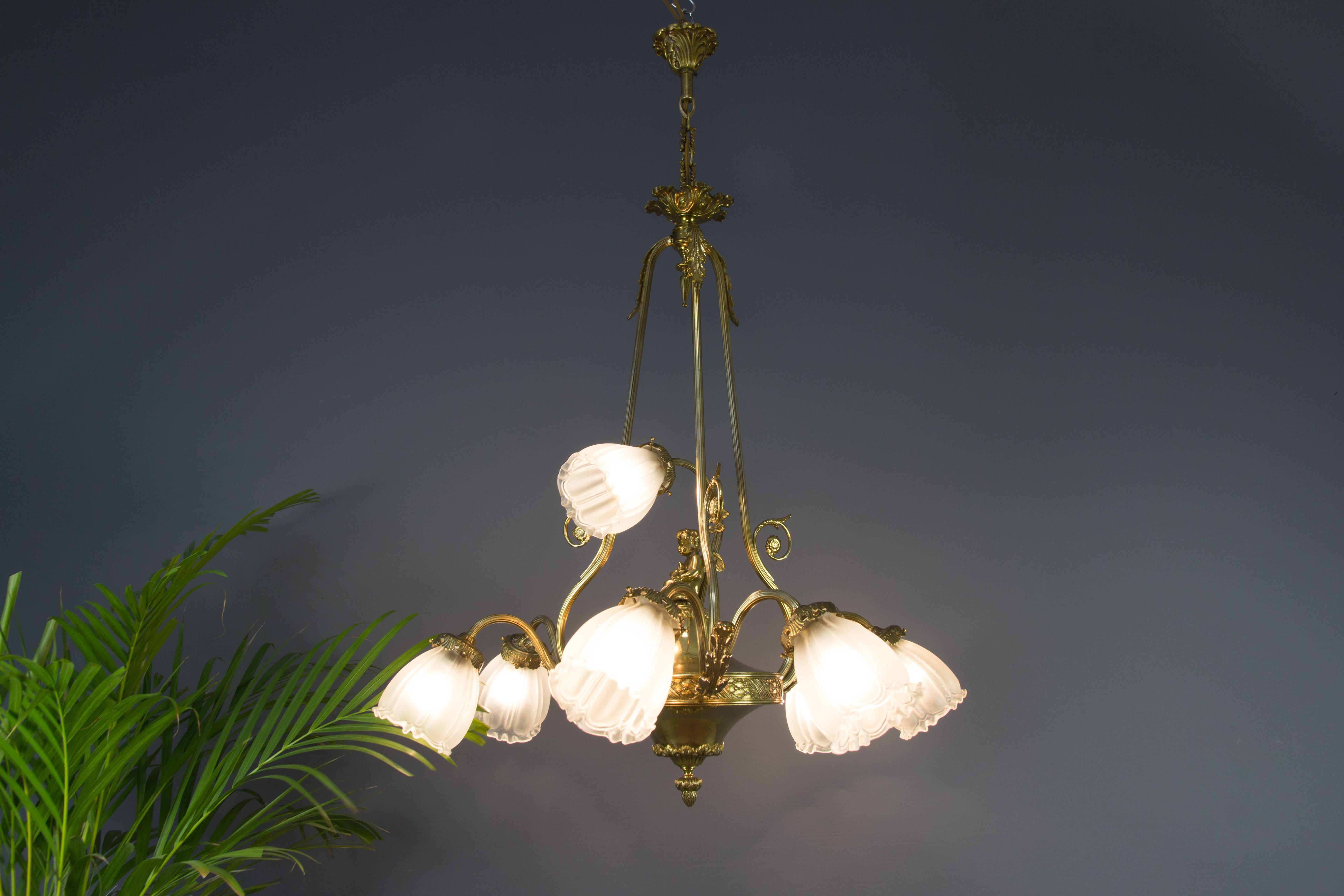 Early 20th Century French Louis XVI Style Seven-Light Brass, Bronze and Glass Cherub Chandelier