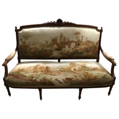 Sillón francés de siete piezas estilo Luis XVI , nogal s. XIX con aubusson