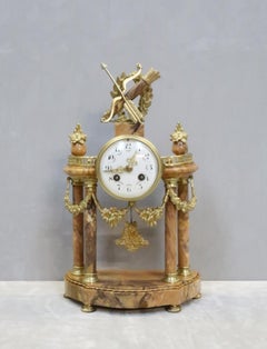 French Louis XVI Style Sienna Marble and Bronze Gilt Clock Set