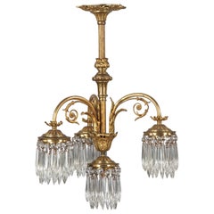 Antique French Louis XVI Style Solid Brass and Crystals Four-Light Chandelier, 1870s