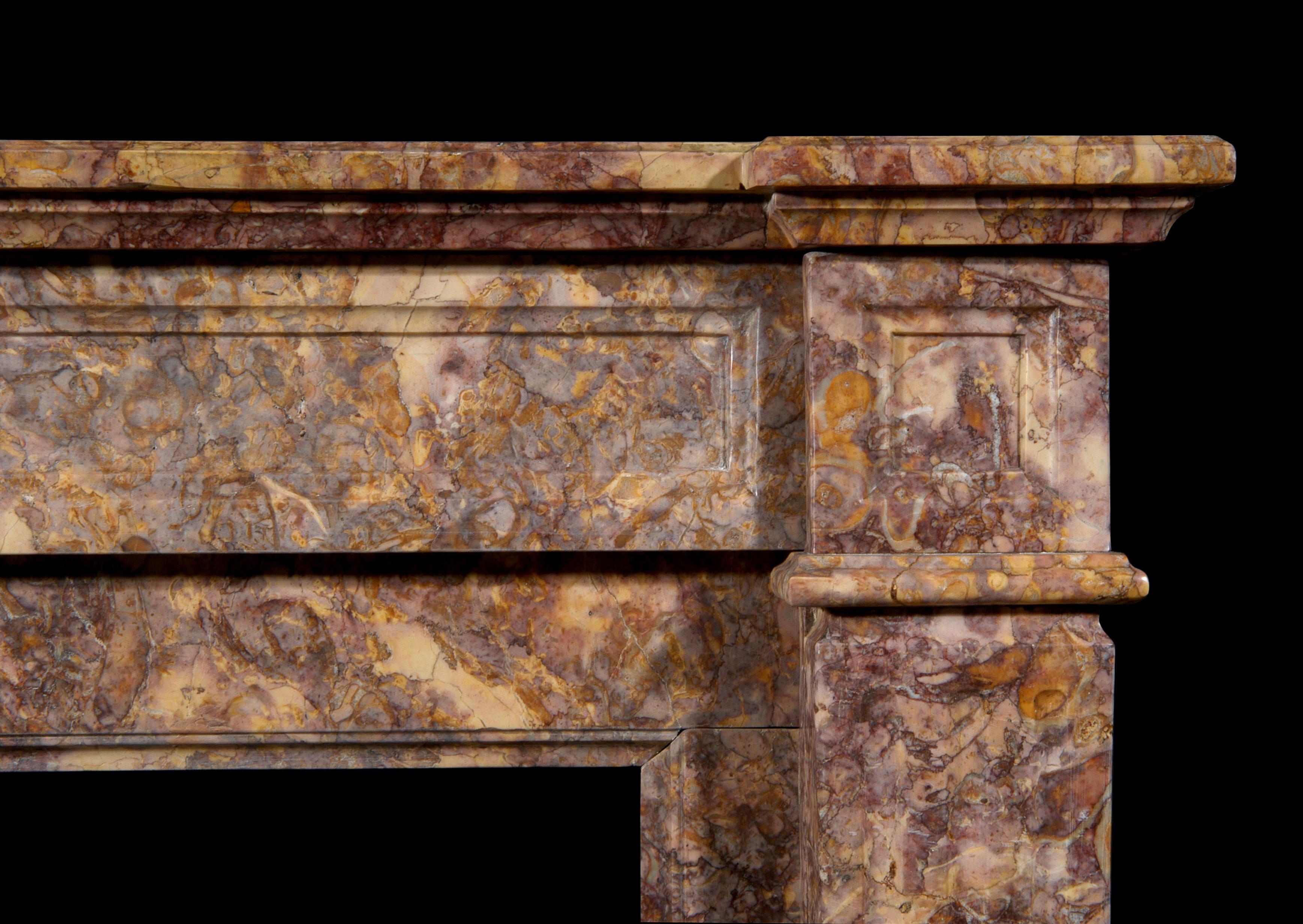 19th century French Louis XVI style Spanish Brocatelle marble fireplace, with plain moulded panelled frieze and side blockings, fluted jambs. Breakfront moulded shelf.

Measures: 
Shelf Width:	1145 mm      	45 1/8 in
Overall Height:	1040 mm      	41