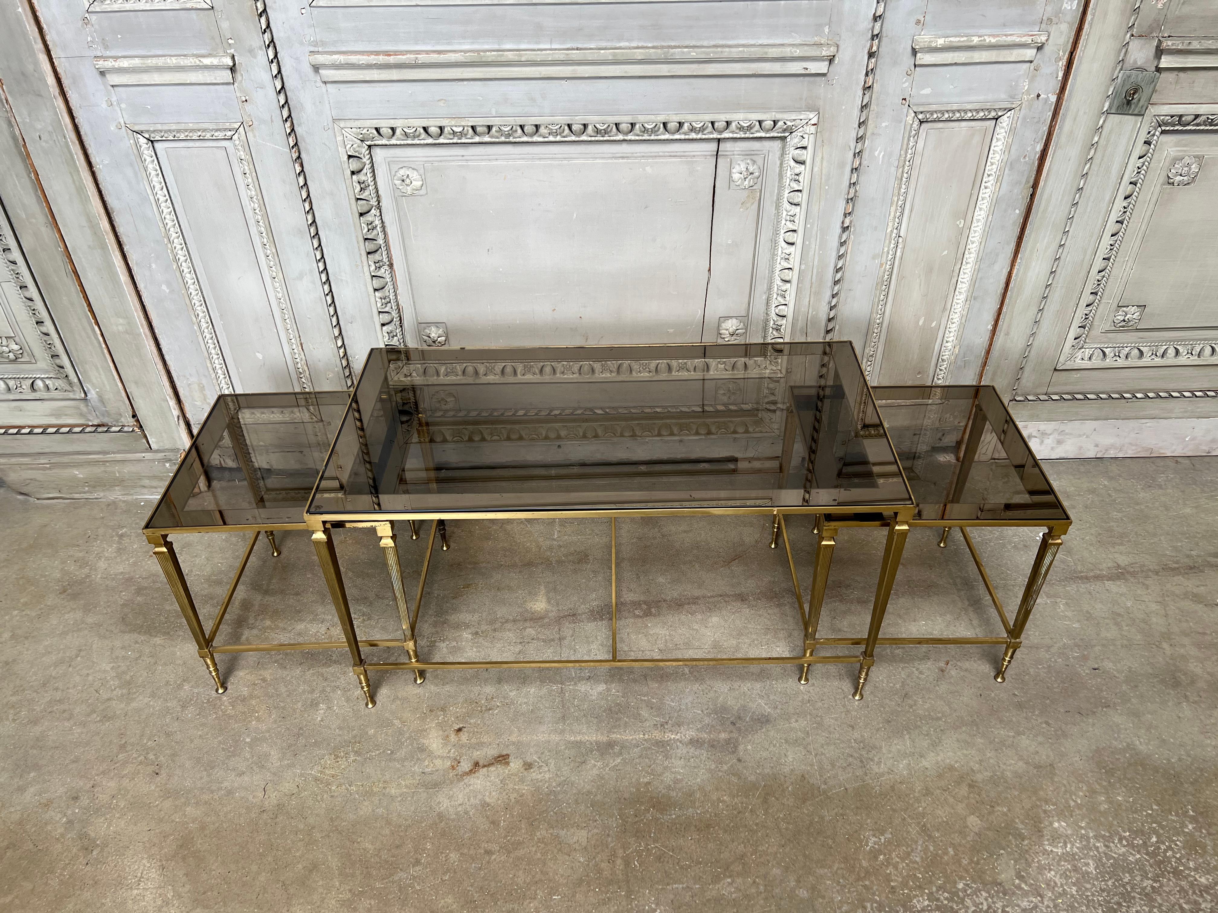 Cast French Louis XVI Style Three Piece Brass and Glass Coffee Table For Sale