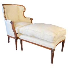French Louis XVI Style Two Piece Bergere Chair and Ottoman Set Duchesse Brisee