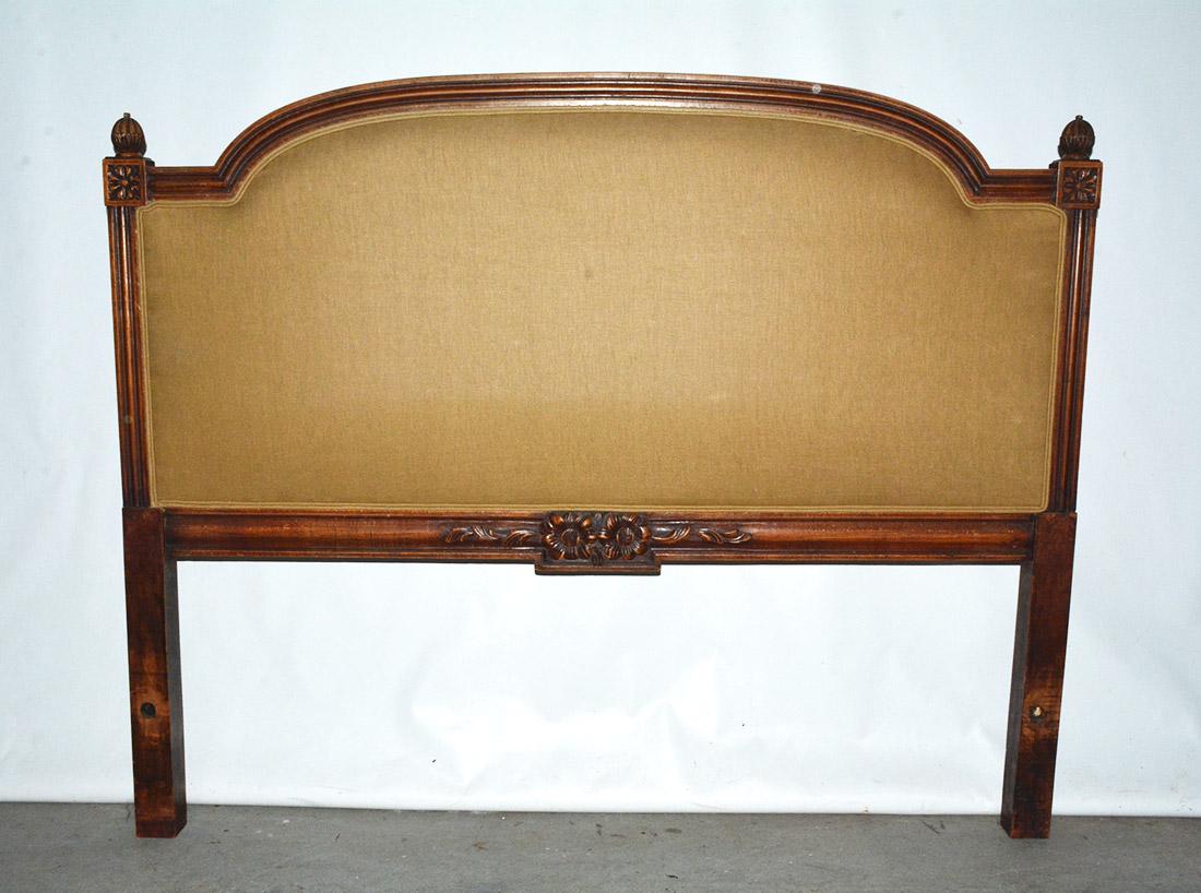 French Louis XVI Style queen size headboard flanked with fluted side posts accented with carved rosettes and topped with decorative finials, solid wood constructed frame. The headboard has an upholstered back for added comfort to lean against.