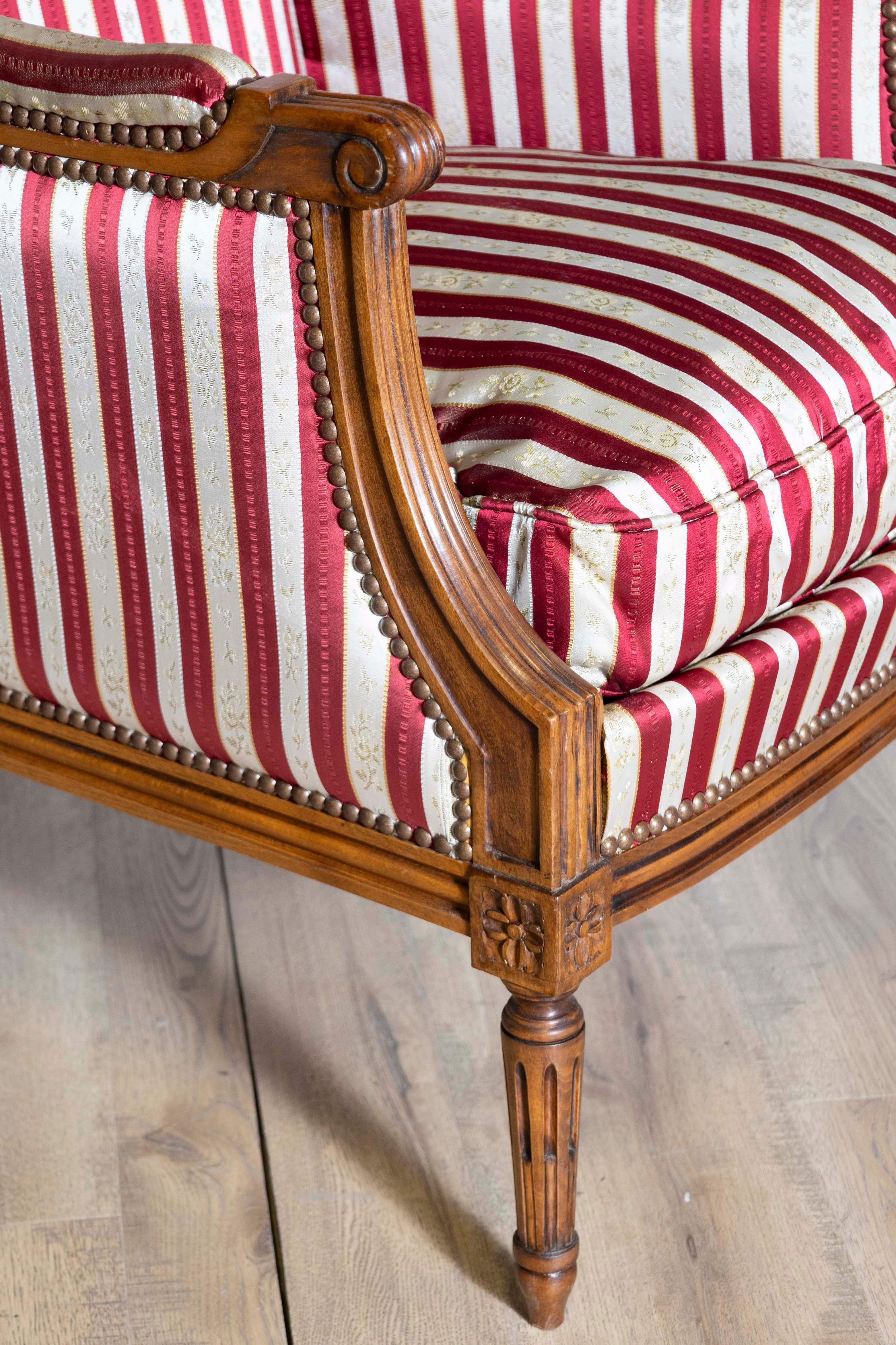 Upholstery French Louis XVI Style Walnut Bergères à Oreilles with Fluted Legs, a Pair For Sale