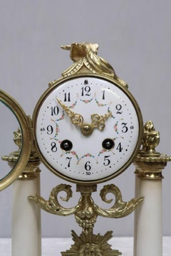 French Louis XVI Style White Marble and Bronze Gilt Mantel Clock by Samuel Marti