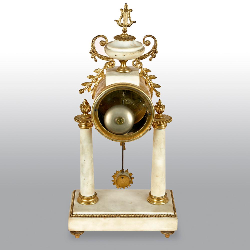 French Louis XVI Style White Marble and Gilt Metal Mounted Clock Set In Good Condition In Uckfield, Sussex